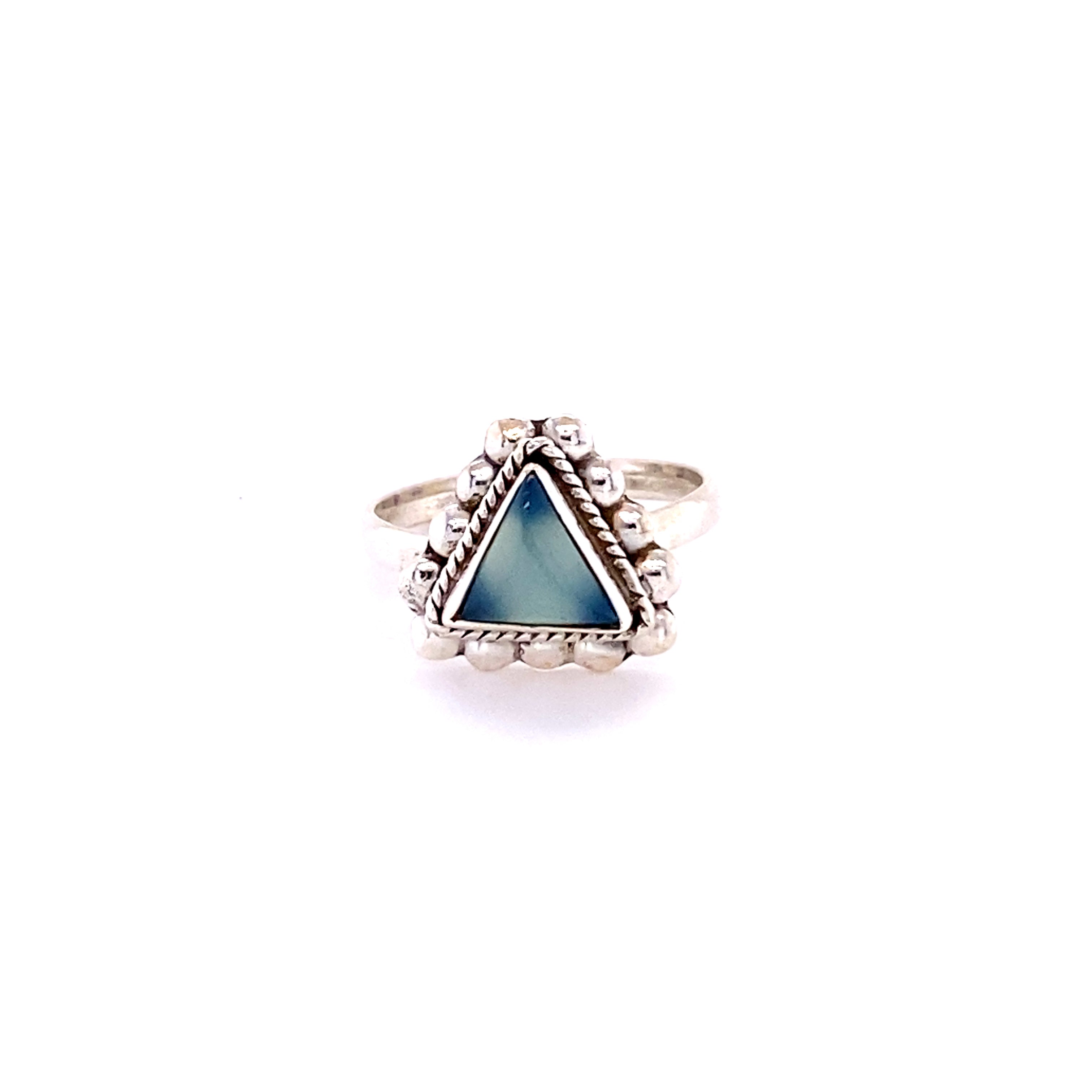 A Triangle Gemstone Ring with Beads with a cabochon stone in the middle.