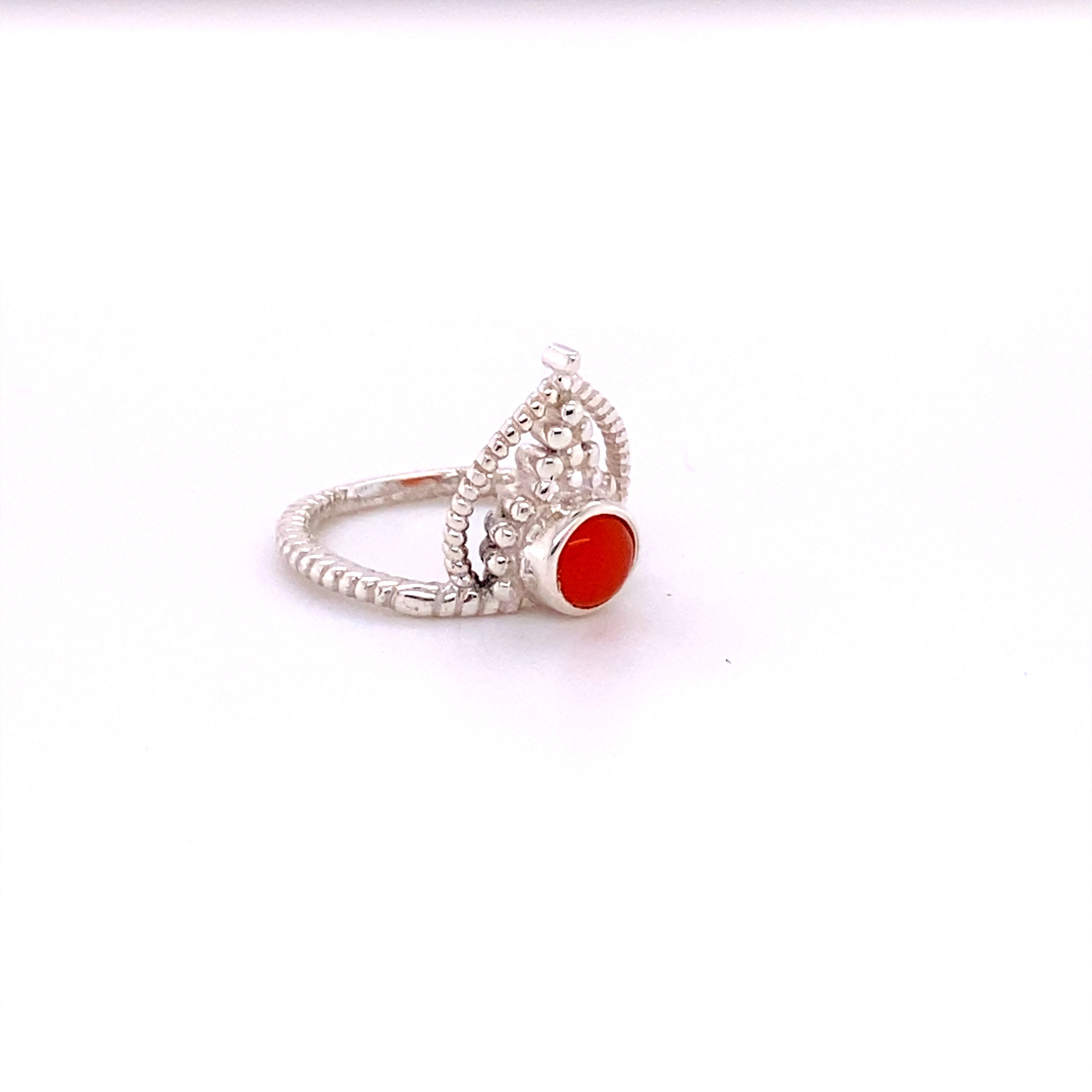 A Simple Tiara Ring with Natural Gemstones, with an orange cabochon stone.