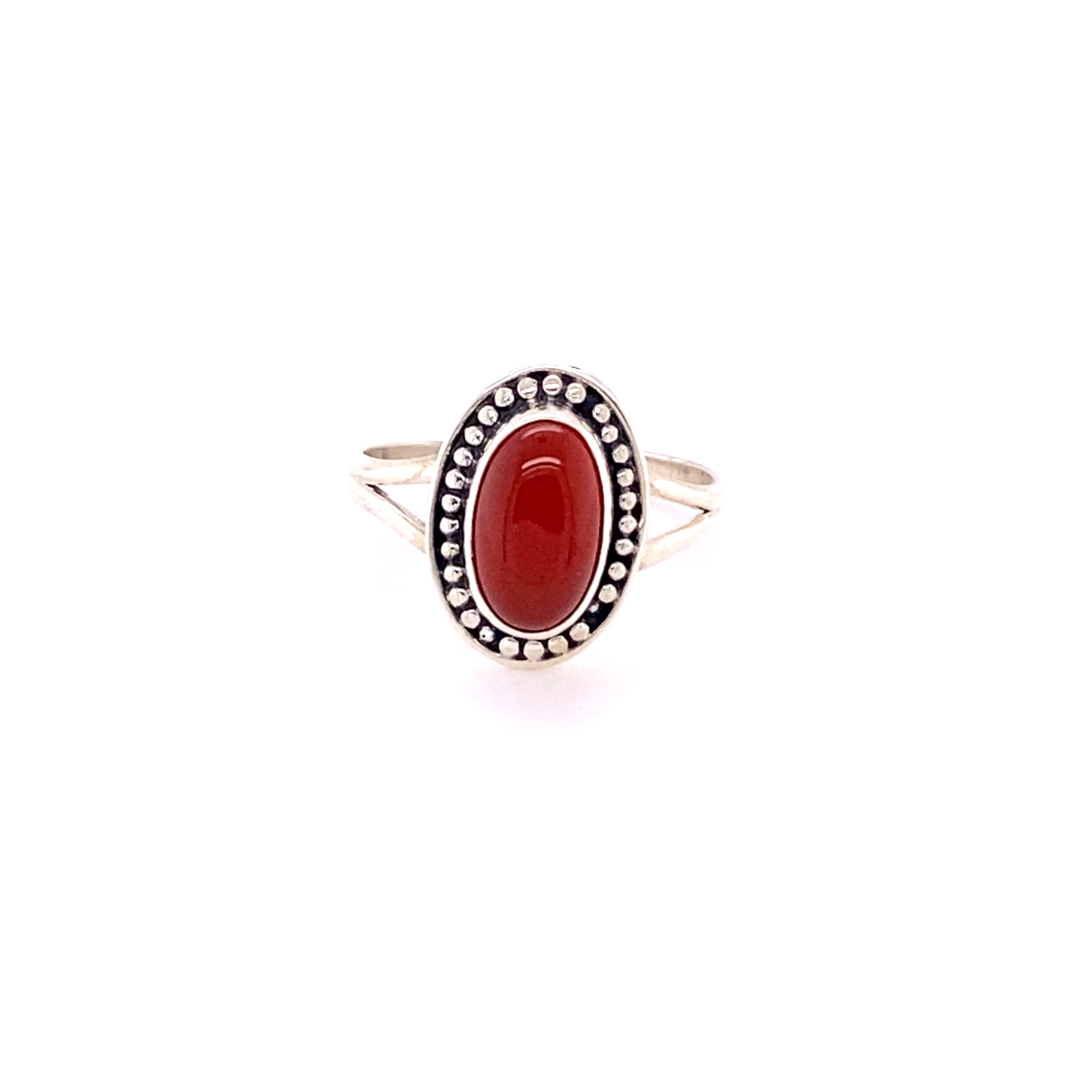 A Super Silver Trendy Oval Ring with a red coral stone made of .925 Sterling Silver.