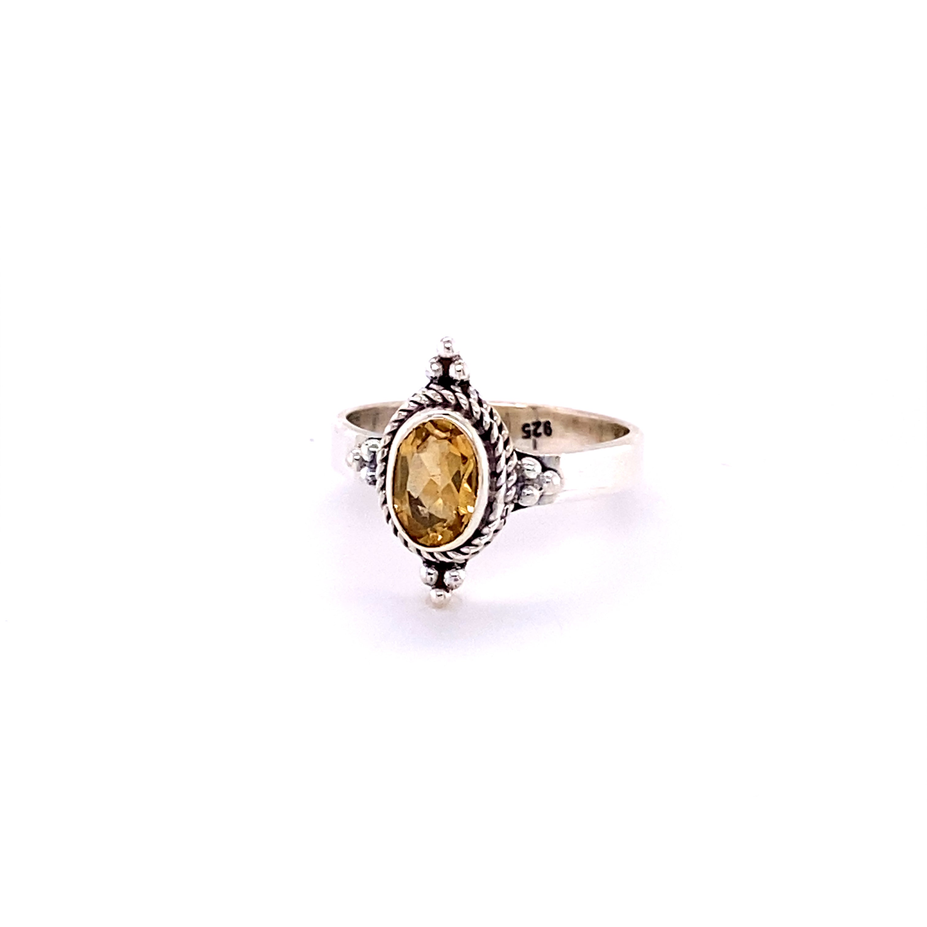 A Four Points Gemstone Ring with a citrine stone.