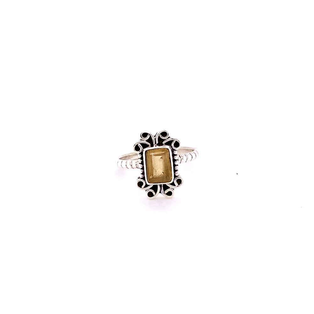 
                  
                    A Natural Gemstone Square Ring with Swirls with a yellow stone in the center.
                  
                