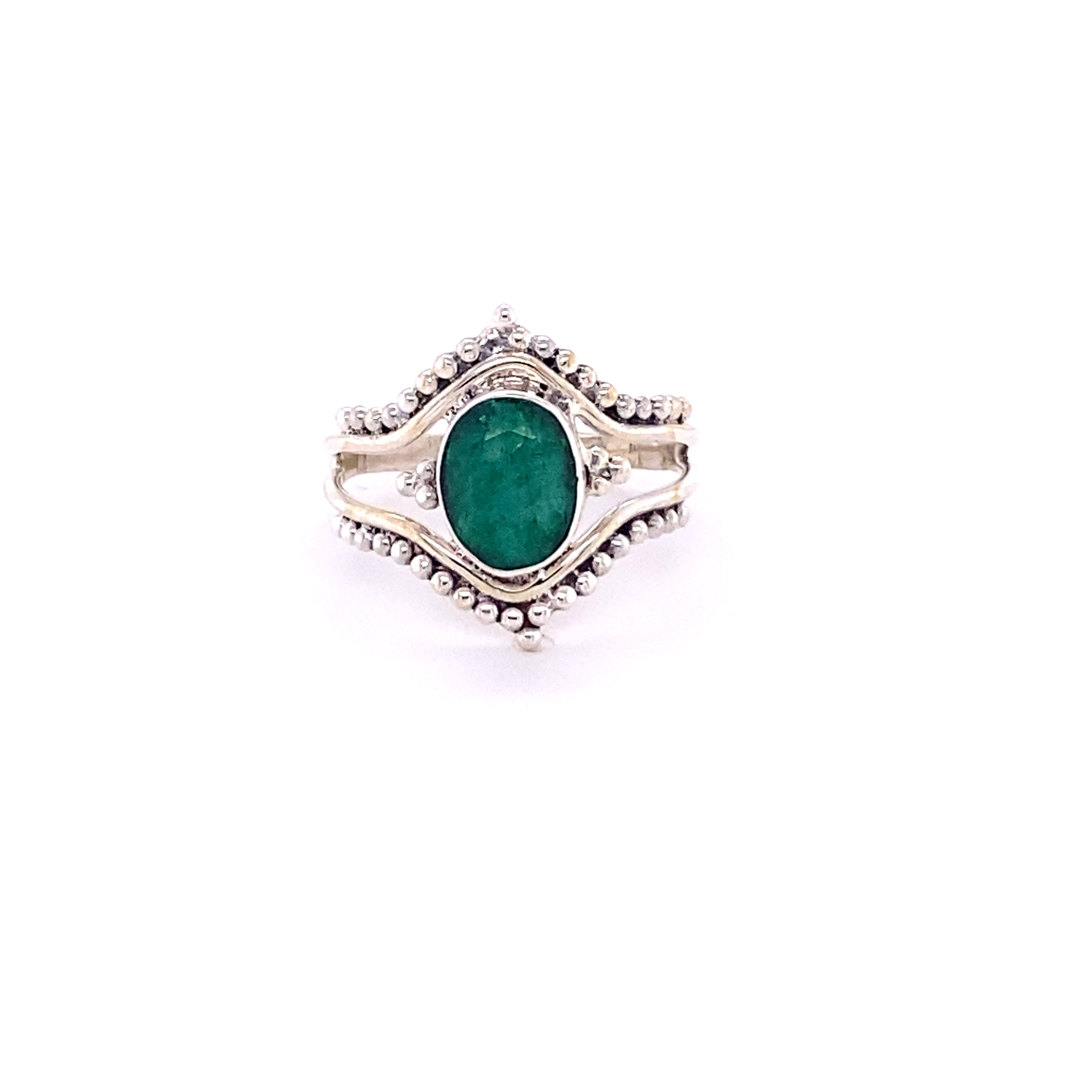 A Double Chevron Gemstone Ring with Ball Design on a Santa Cruz background.