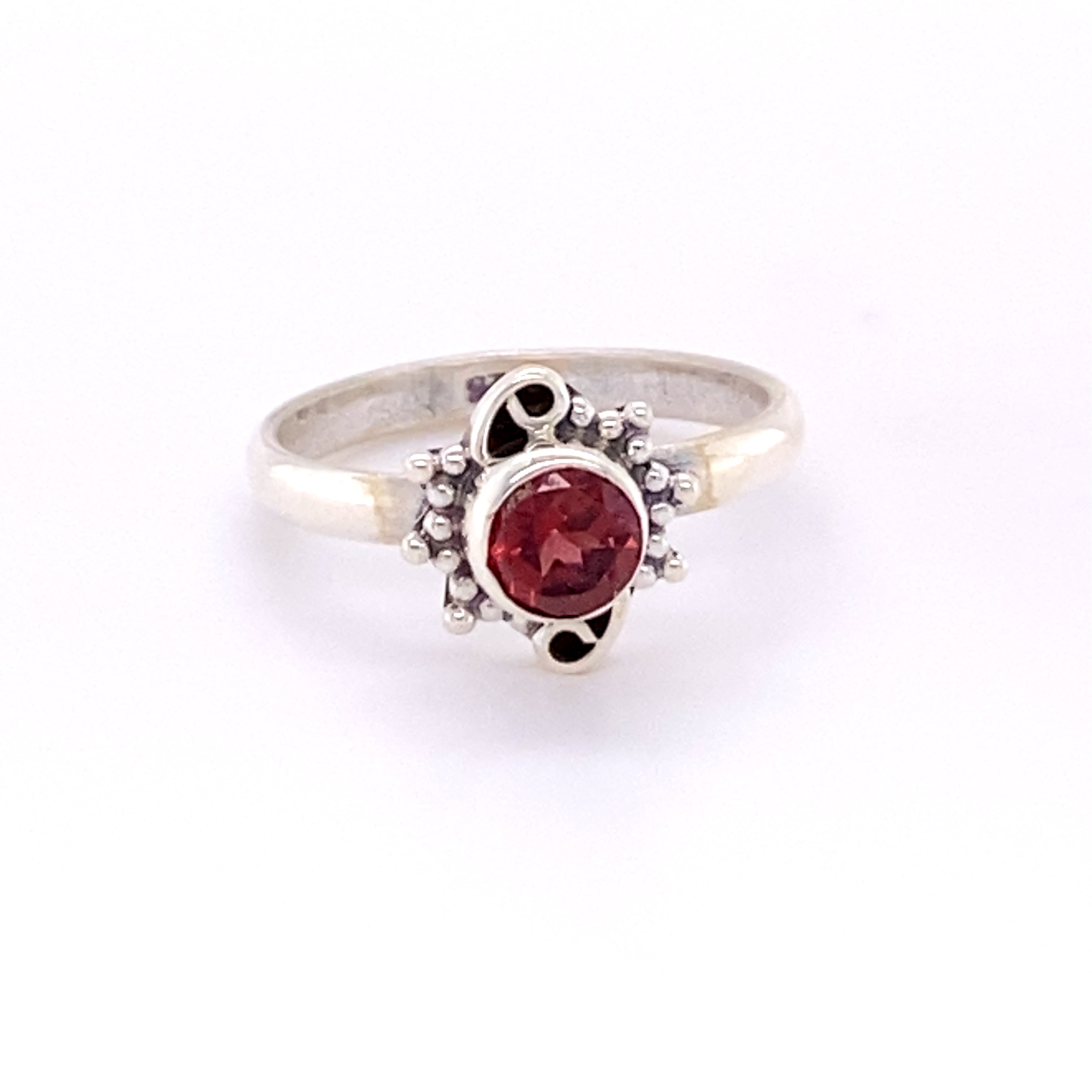 A boho Small Round Gemstone Ring with Bead and Swirl Border.