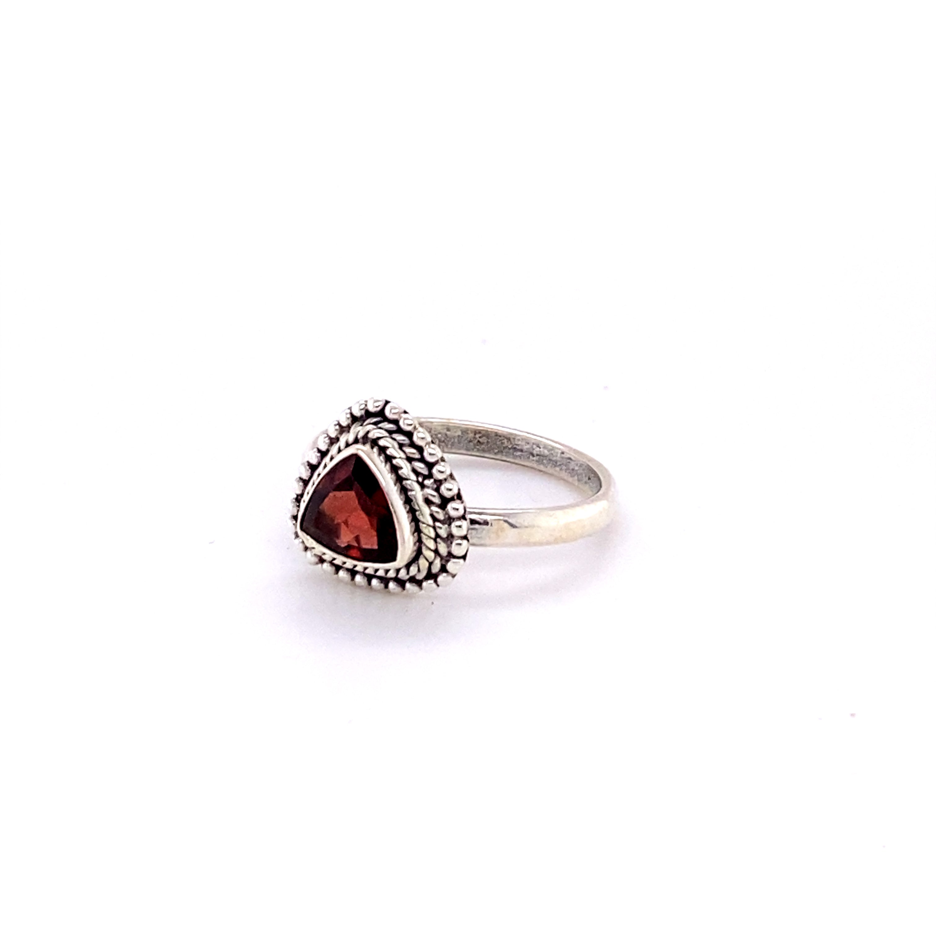 A boho Triangle Gemstone Ring with Rope Border.