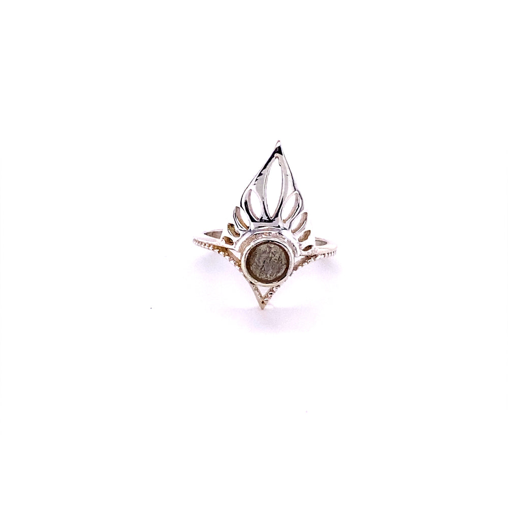 
                  
                    A Henna Shield Ring with Natural Gemstones with a cabochon stone in the middle.
                  
                
