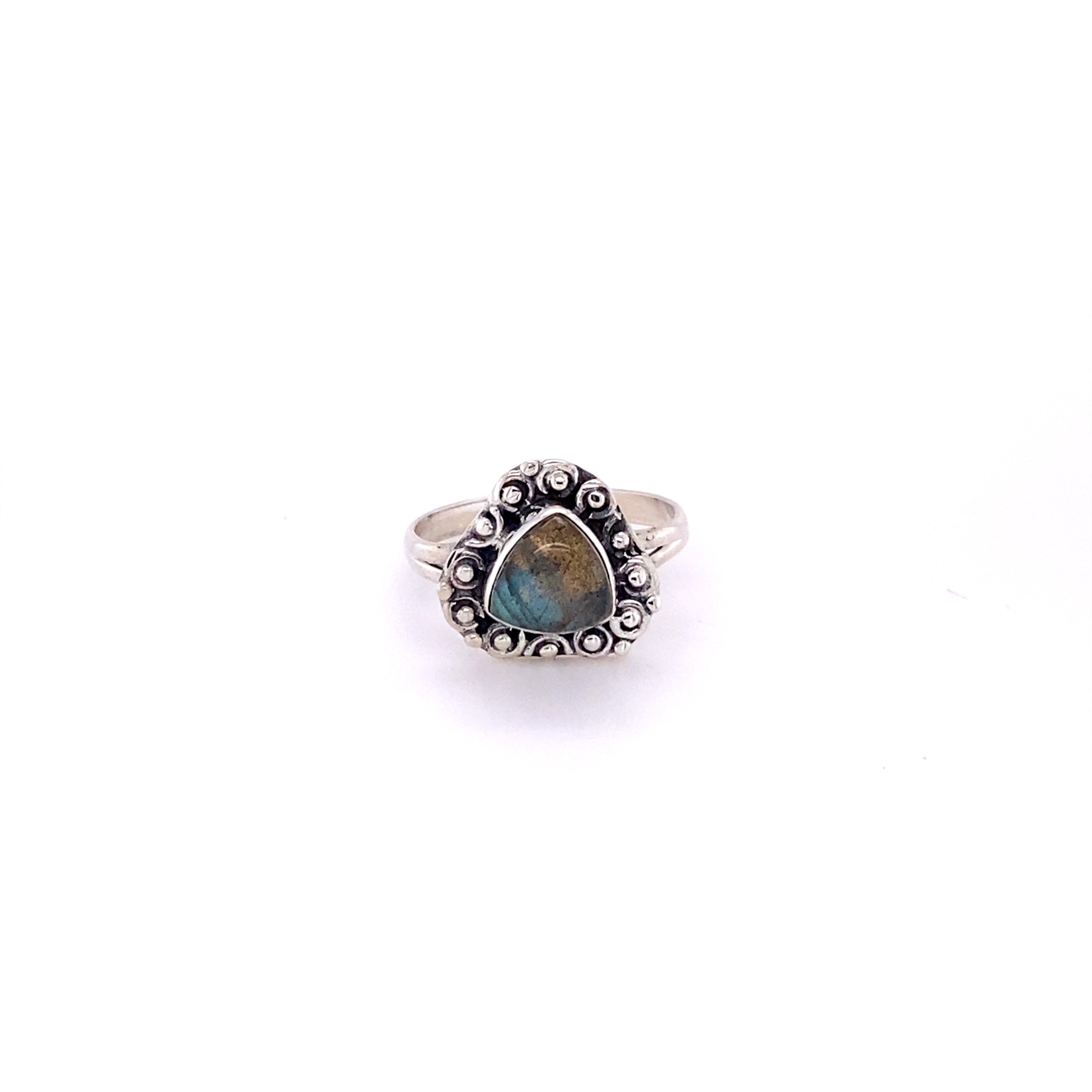 A boho-inspired Triangular Gemstone Ring with A Flat Ball Boarder featuring a mesmerizing labradorite cabochon.