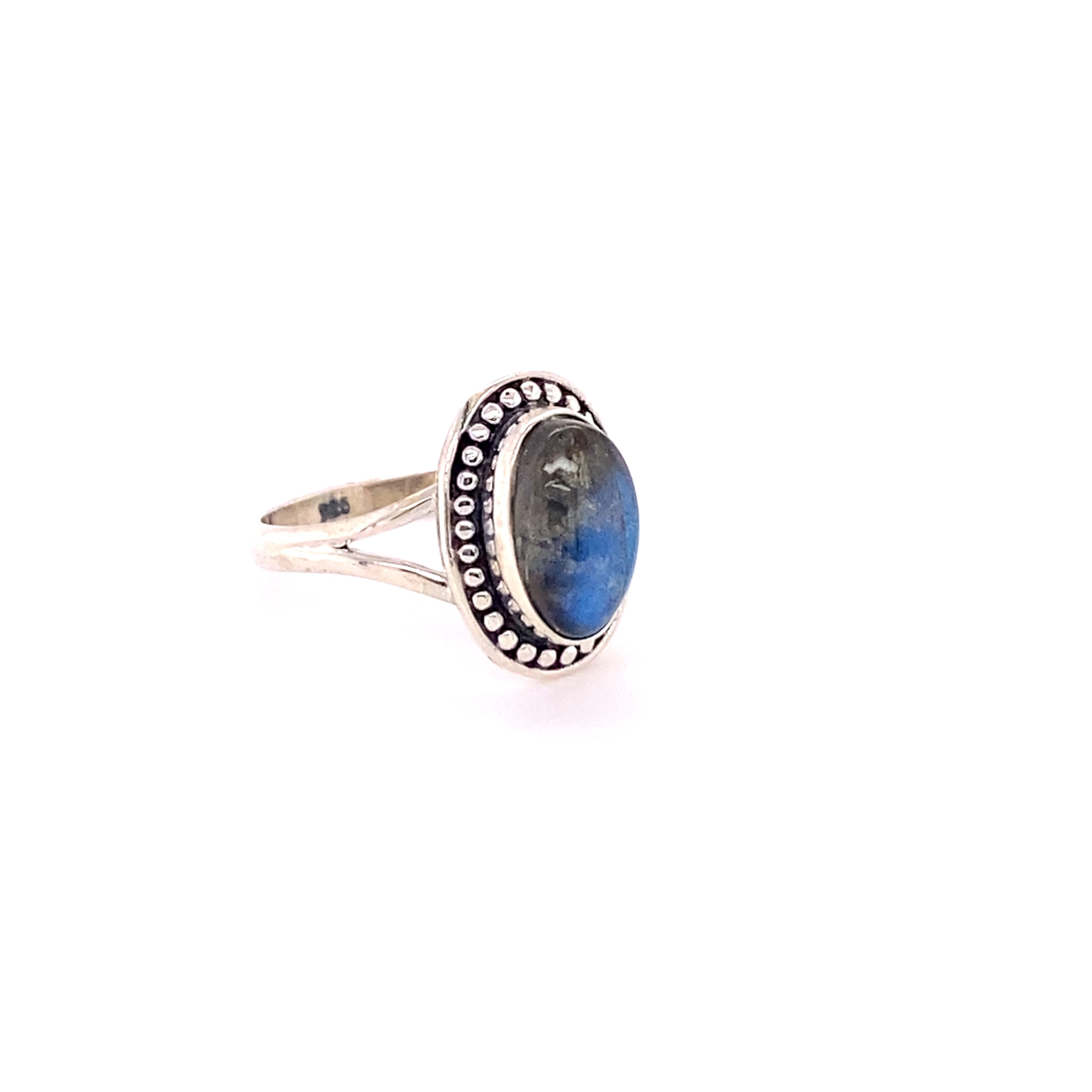 A Trendy Oval Ring by Super Silver with a blue stone.