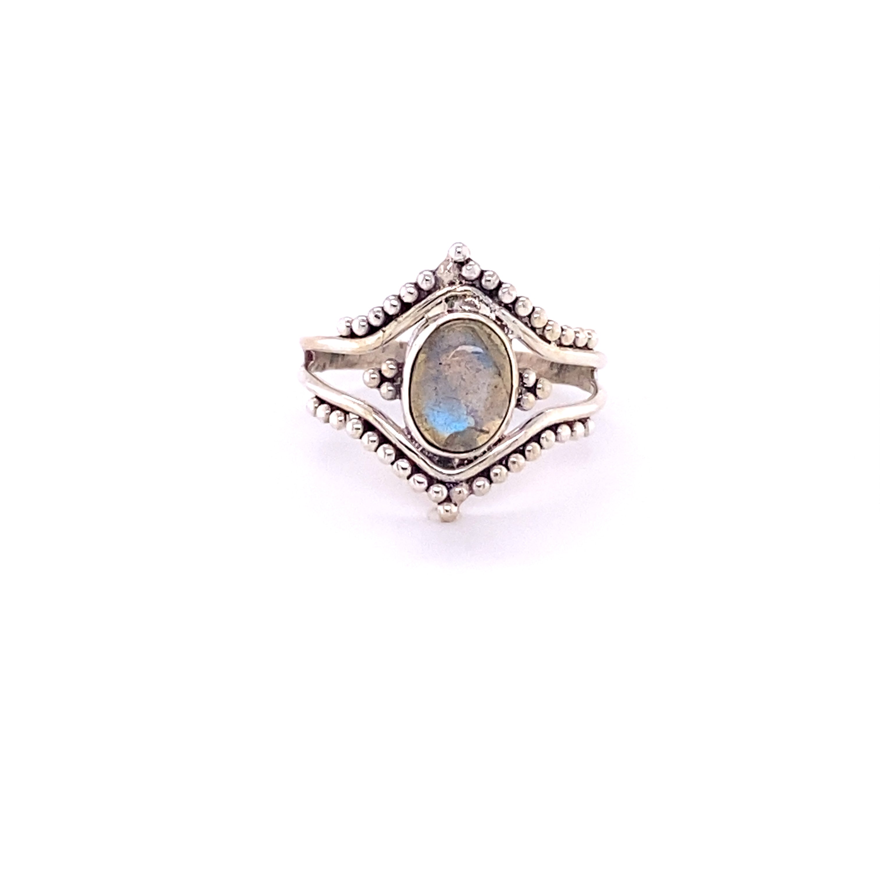 A hippie-inspired Double Chevron Gemstone Ring with Ball Design adorned with a mesmerizing labradorite stone that encapsulates the free-spirited essence of Santa Cruz.