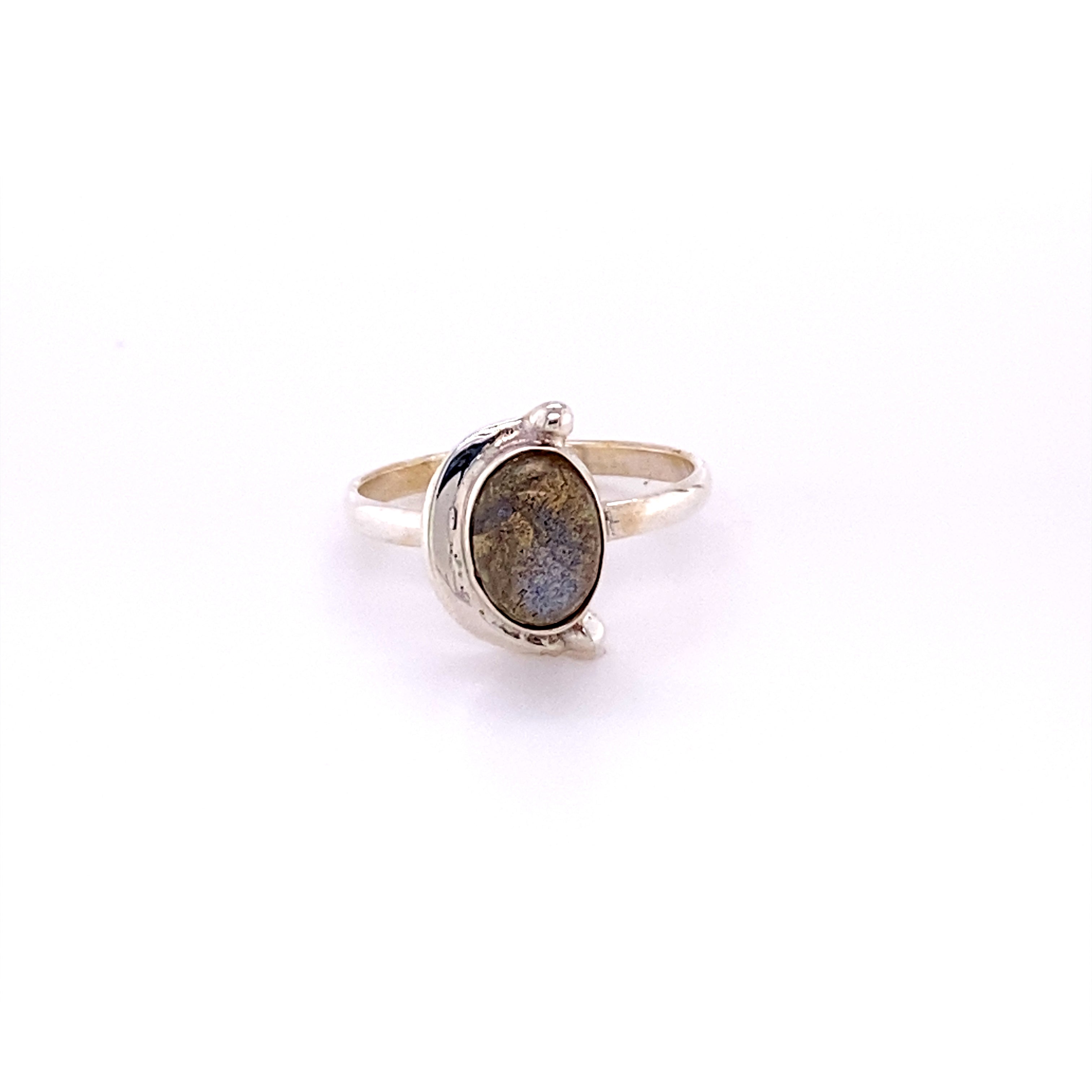 A hippie-inspired Oval Crescent Moon Ring with Natural Gemstones featuring a cabochon labradorite stone.