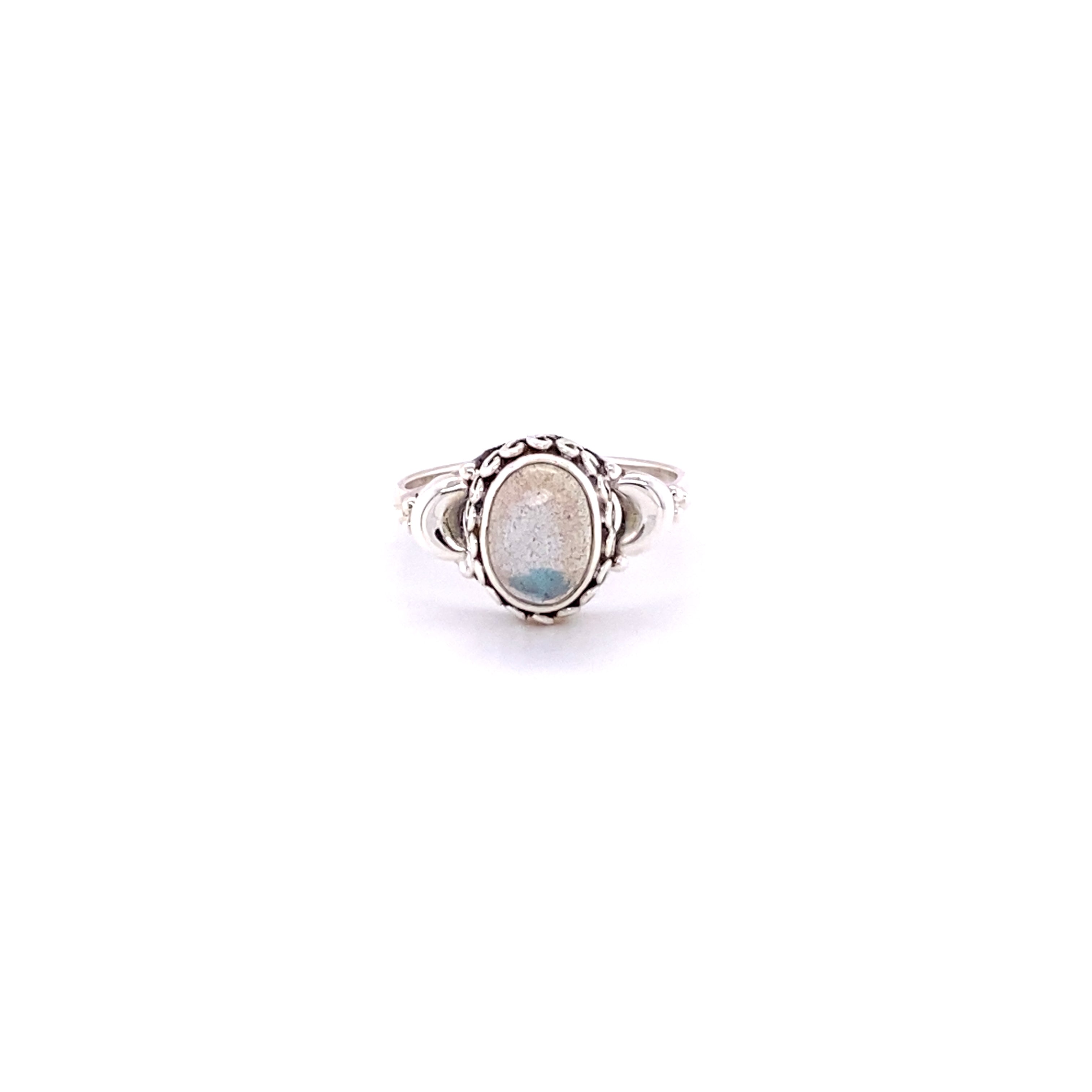 A Beautiful Oval Gemstone Ring with Small Moons.