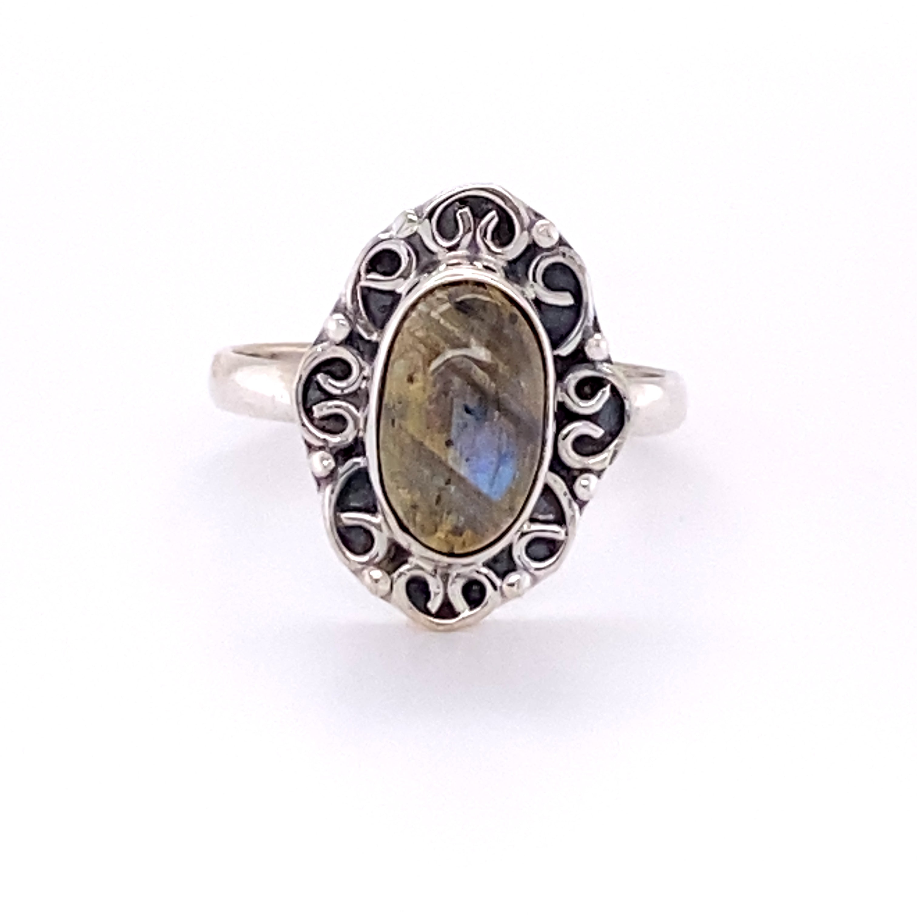 A Oval Gemstone Ring with Swirl Filigree Border, perfect for the hippie at heart or a Santa Cruz loving individual.