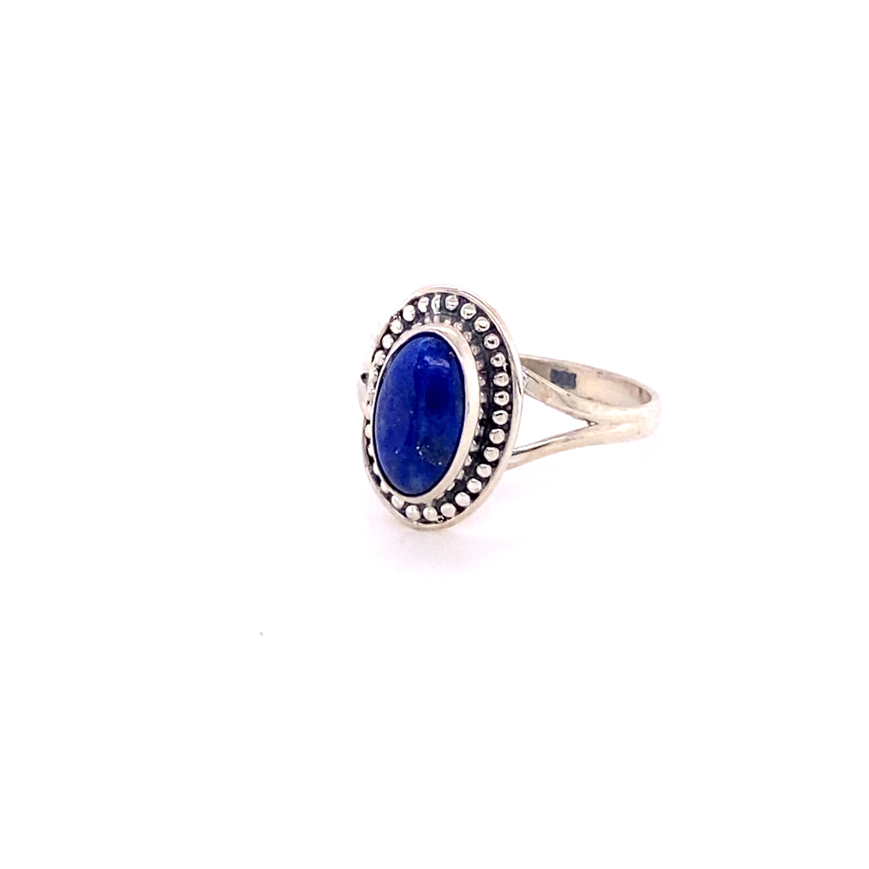 A Trendy Oval Ring featuring a lapis stone. Crafted with .925 Sterling Silver. Brand Name: Super Silver.