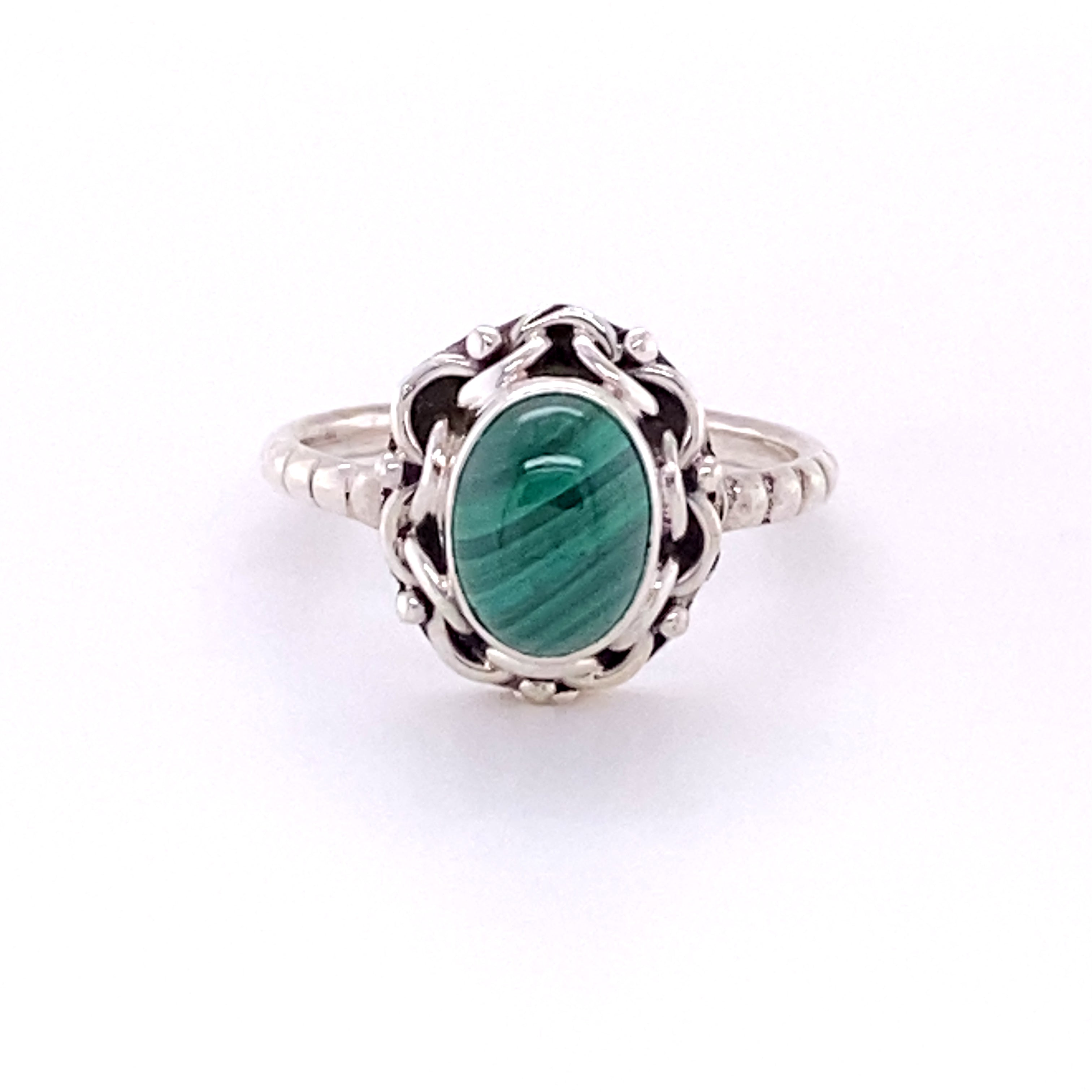 Natural Oval Gemstone Ring with Intricate chain Border and Textured Band featuring a stunning malachite cabochon.