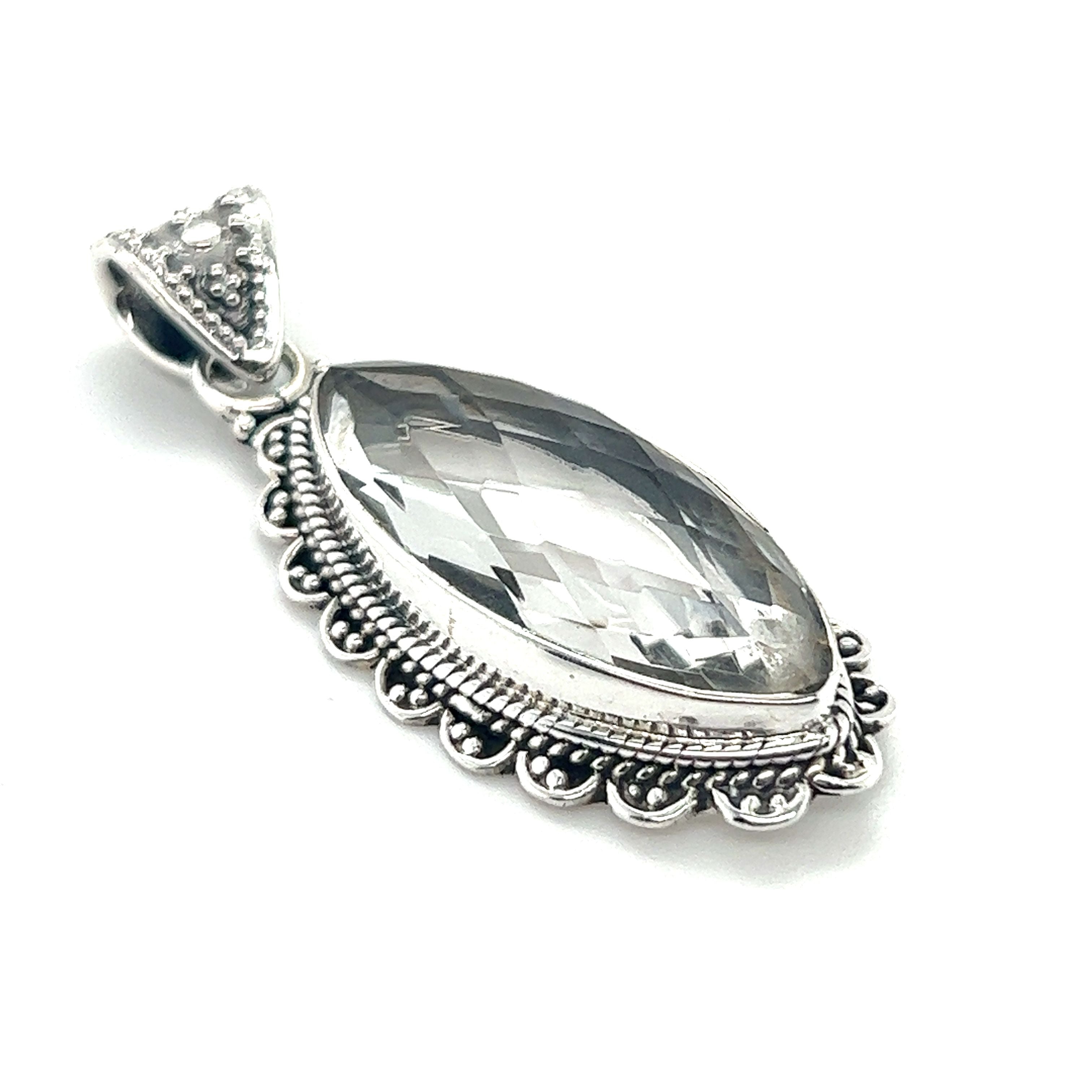 A Marquise Shaped Gemstone Pendant with a clear quartz stone by Super Silver.