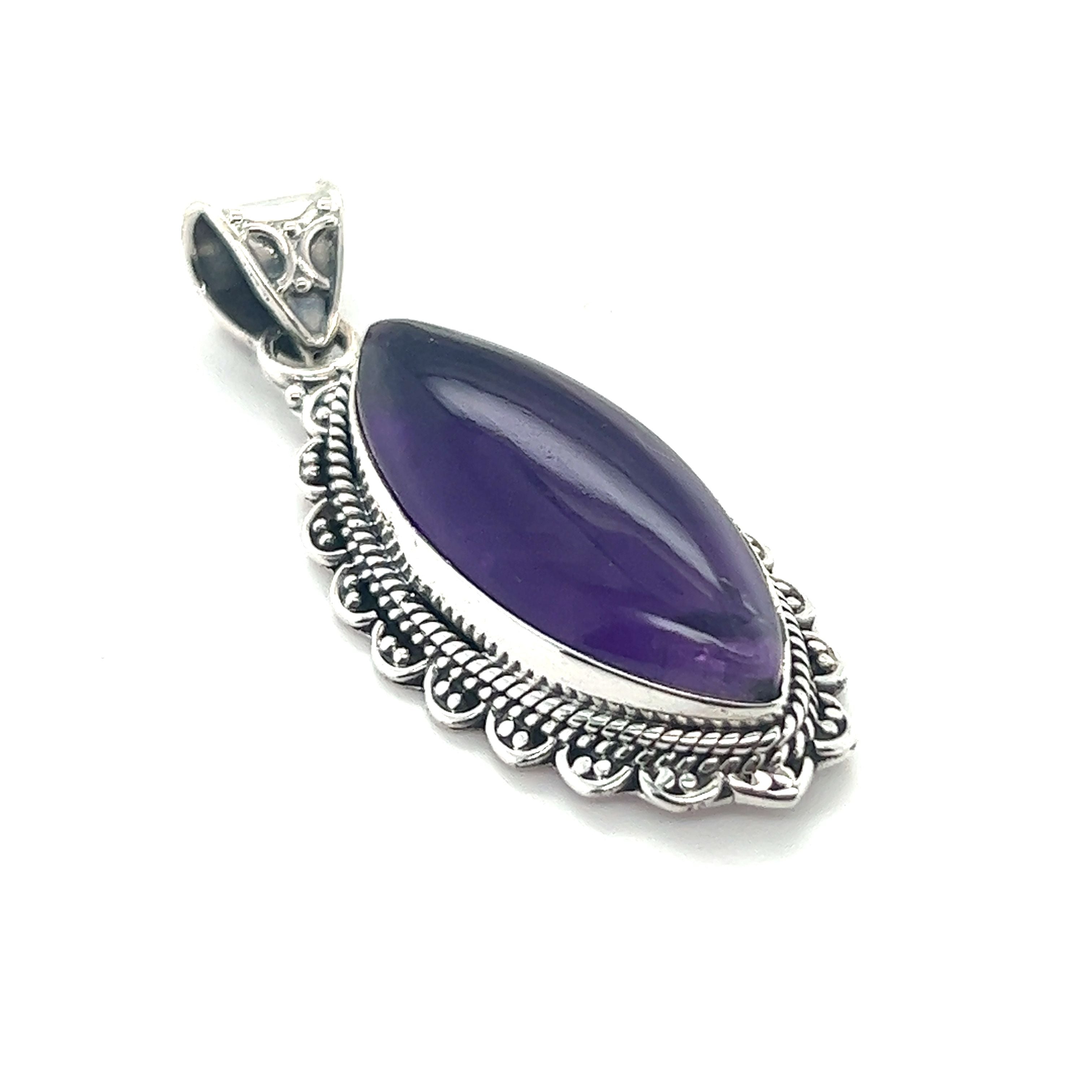 A vivid purple Marquise Shaped Gemstone Pendant in Super Silver.