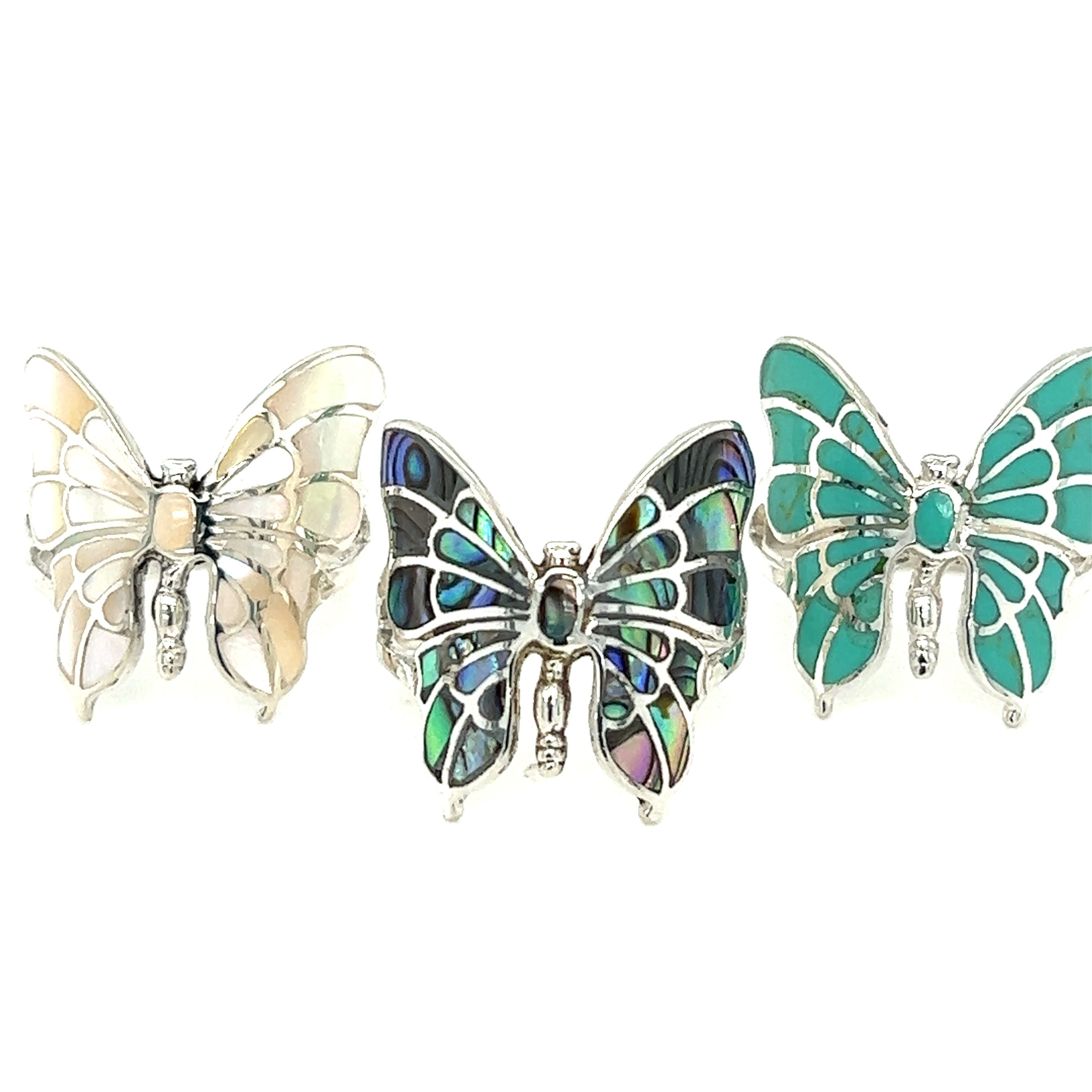 Intricate Statement Butterfly Inlay Ring with turquoise stone.
