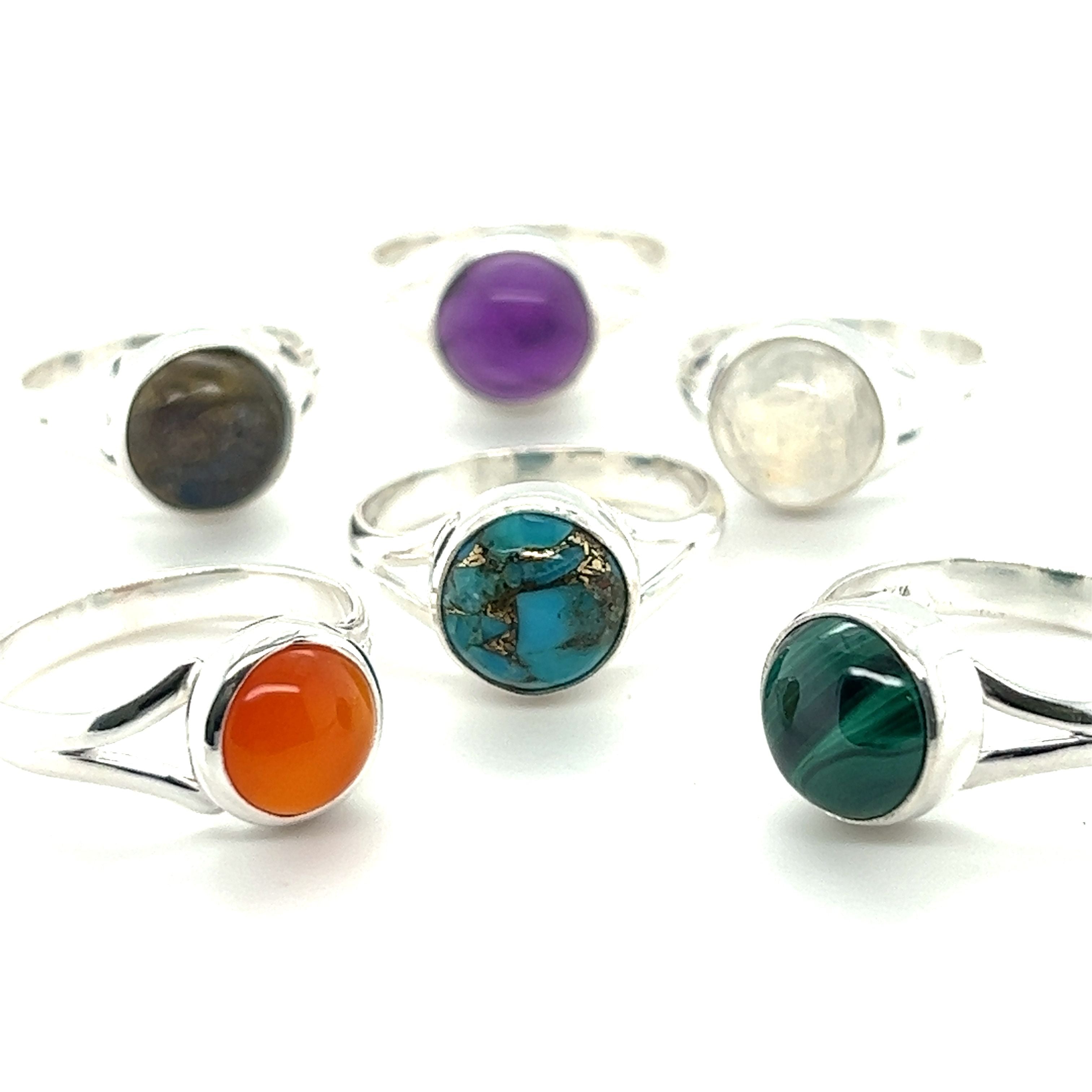 A set of Super Silver Simple Vibrant Circular Stone Rings.