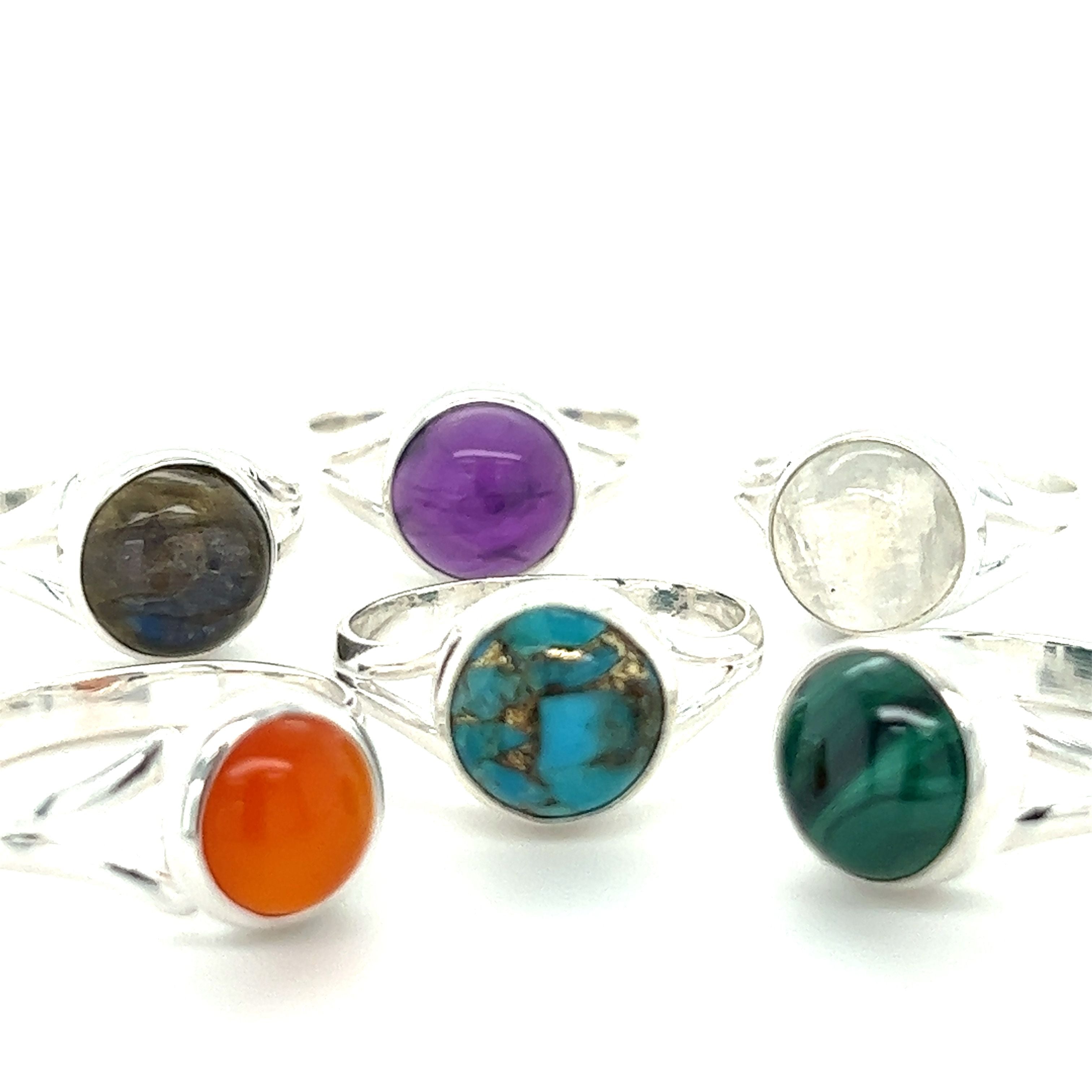 A set of Super Silver Simple Vibrant Circular Stone Rings.
