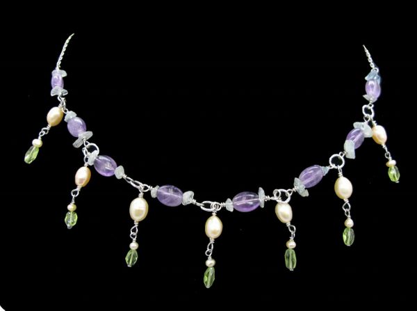 An elegant Sterling Beaded Stone Necklace with multicolored beaded and pearl accents by Super Silver.