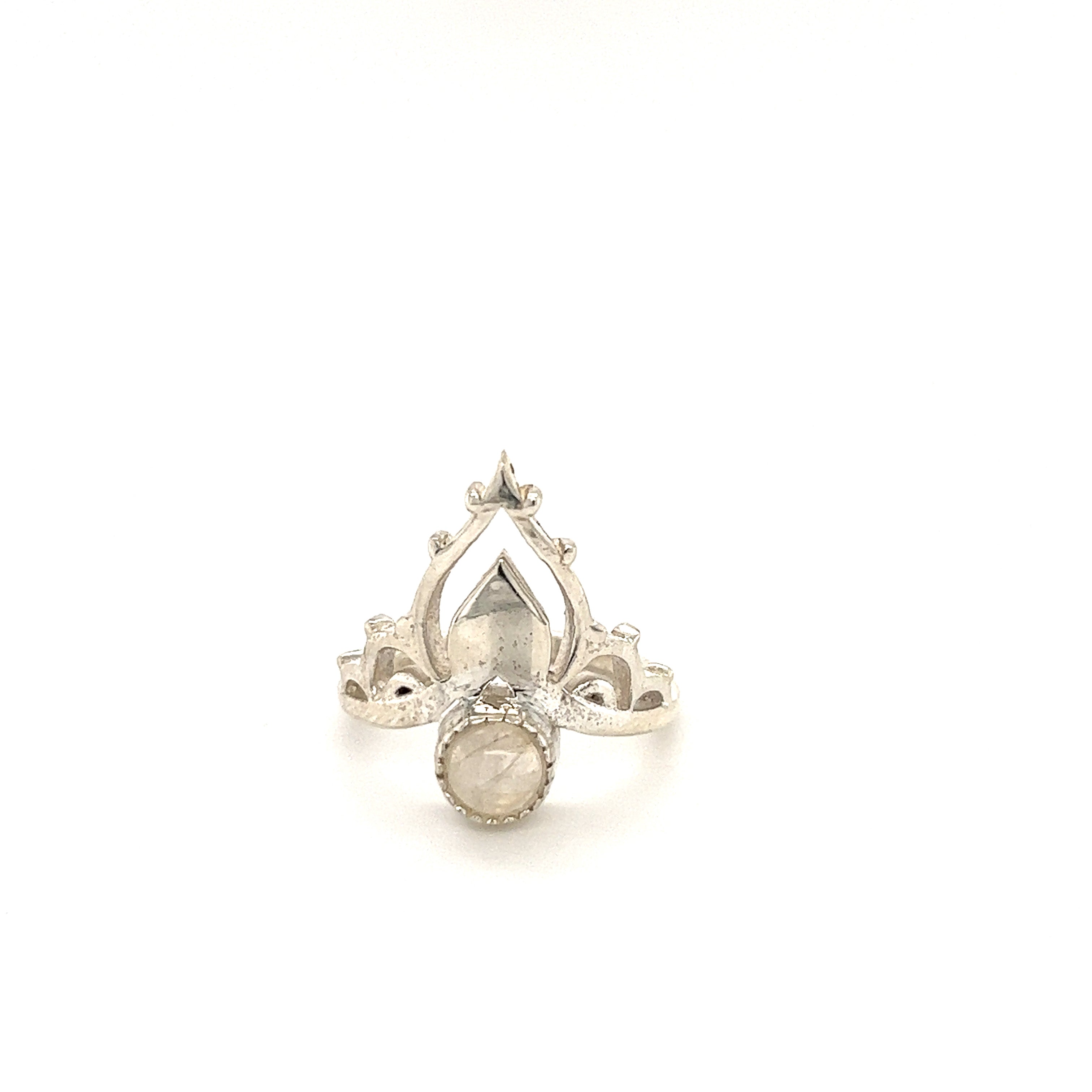 A Mandala Crown Ring with Natural Gemstones with a diamond stone in the center.