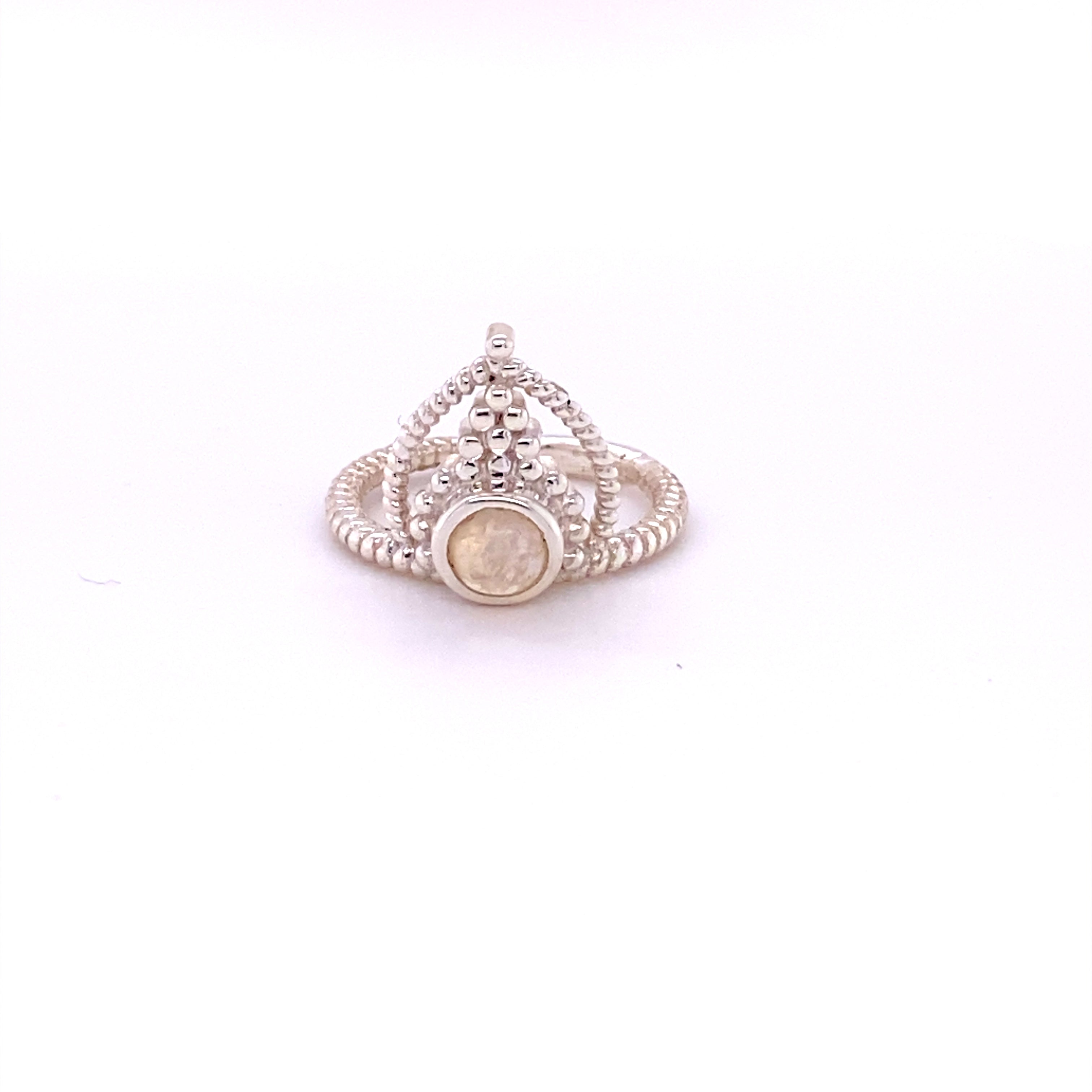 A Simple Tiara Ring with Natural Gemstones with a cabochon stone in the middle.