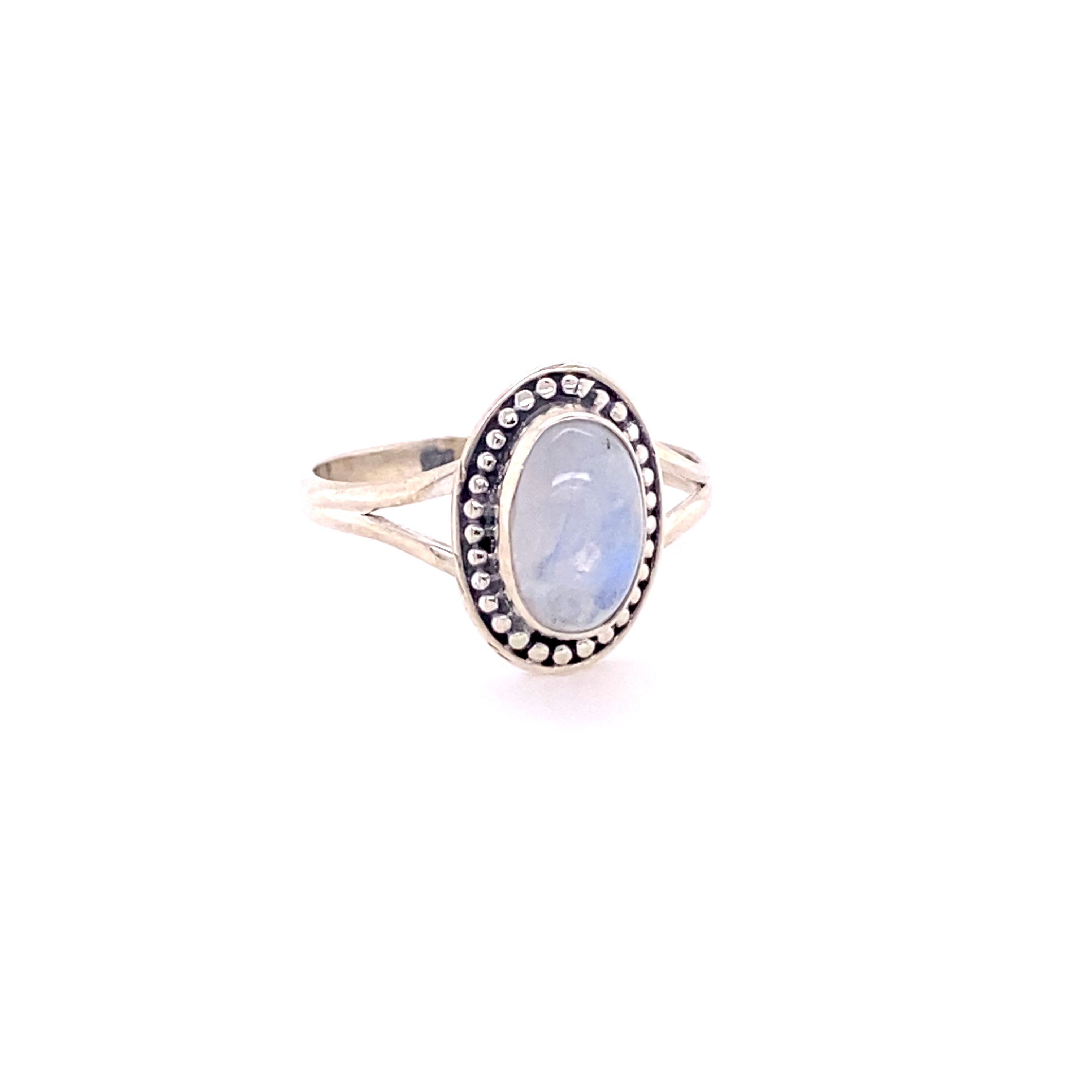 A Trendy Oval Ring featuring a blue stone and diamonds, crafted from .925 Sterling Silver by Super Silver.