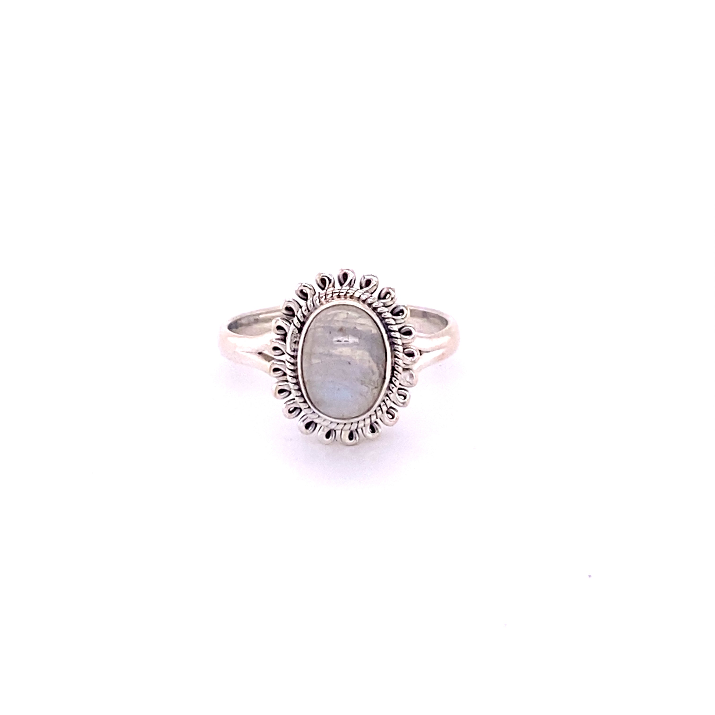 A Hippie-Chic Oval Gemstone Flower Ring with a moonstone in the center by Super Silver.