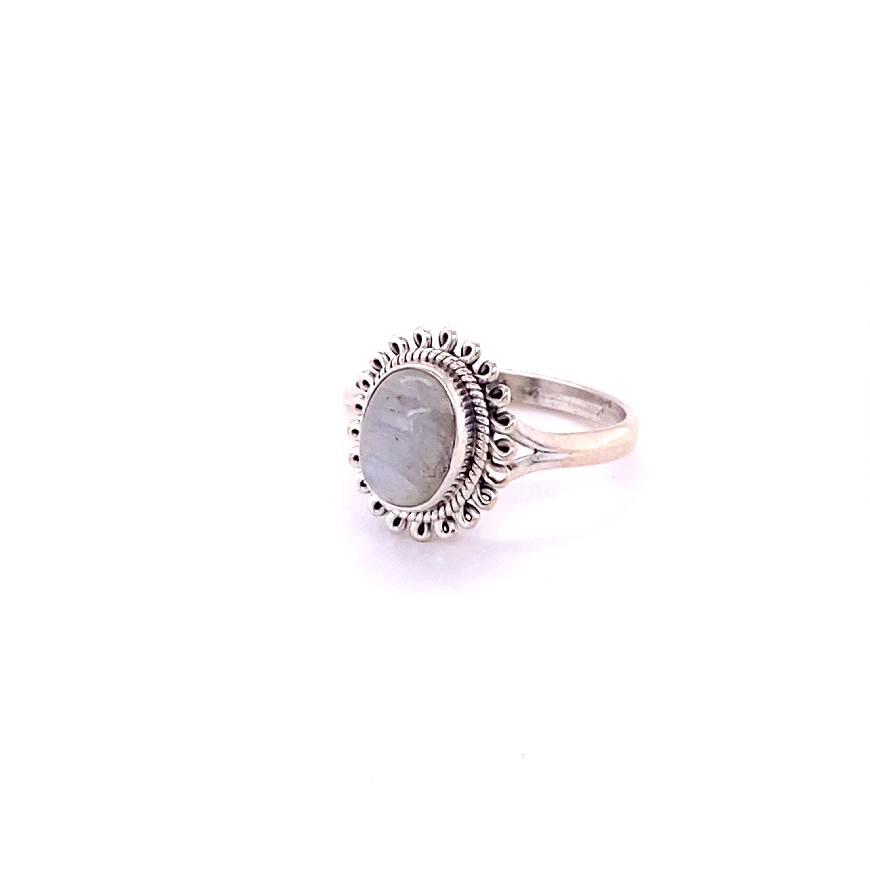 A Super Silver Hippie-Chic Oval Gemstone Flower Ring with a gemstone in the middle.