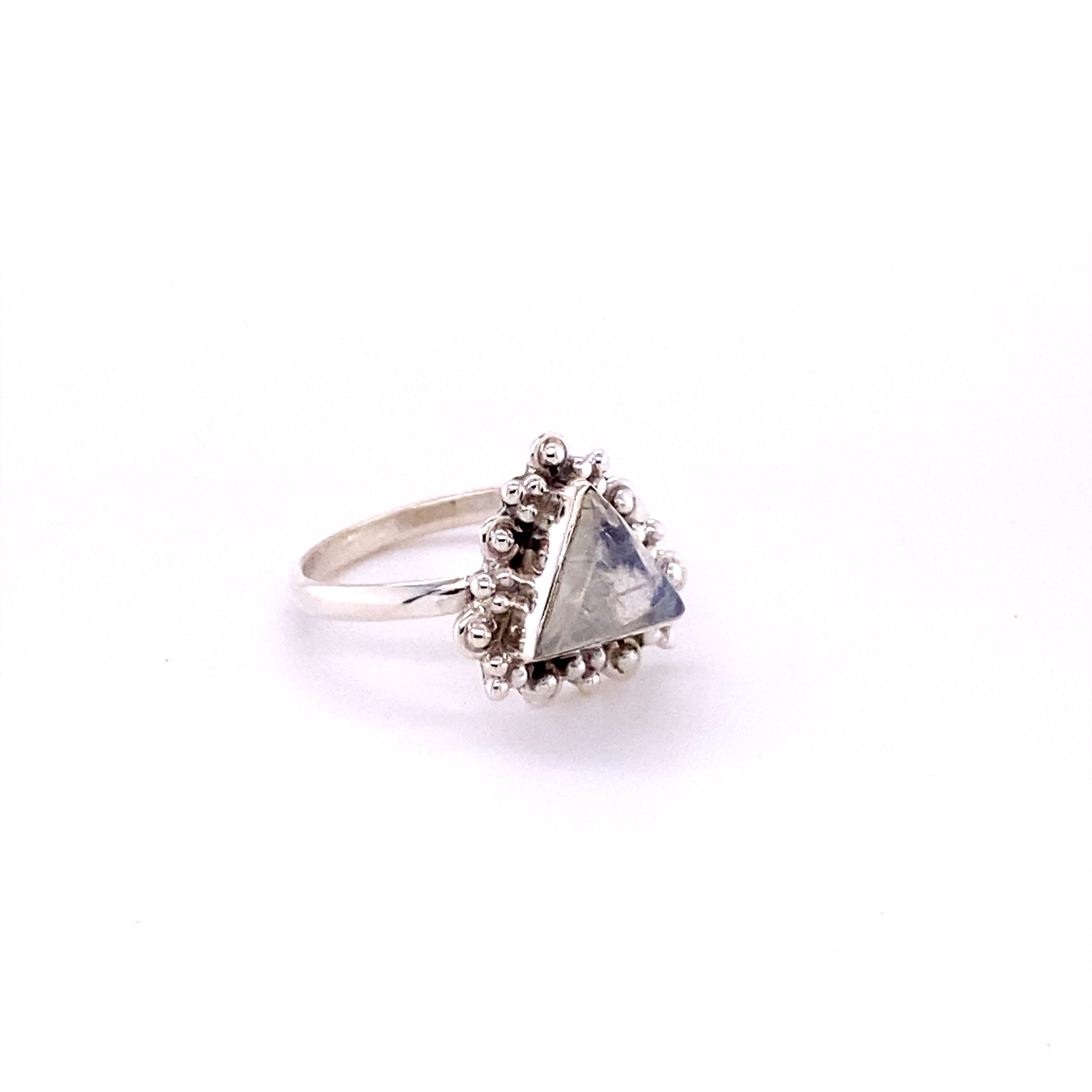 A Super Silver Delicate Gemstone Triangle Ring with a reconstituted turquoise stone.