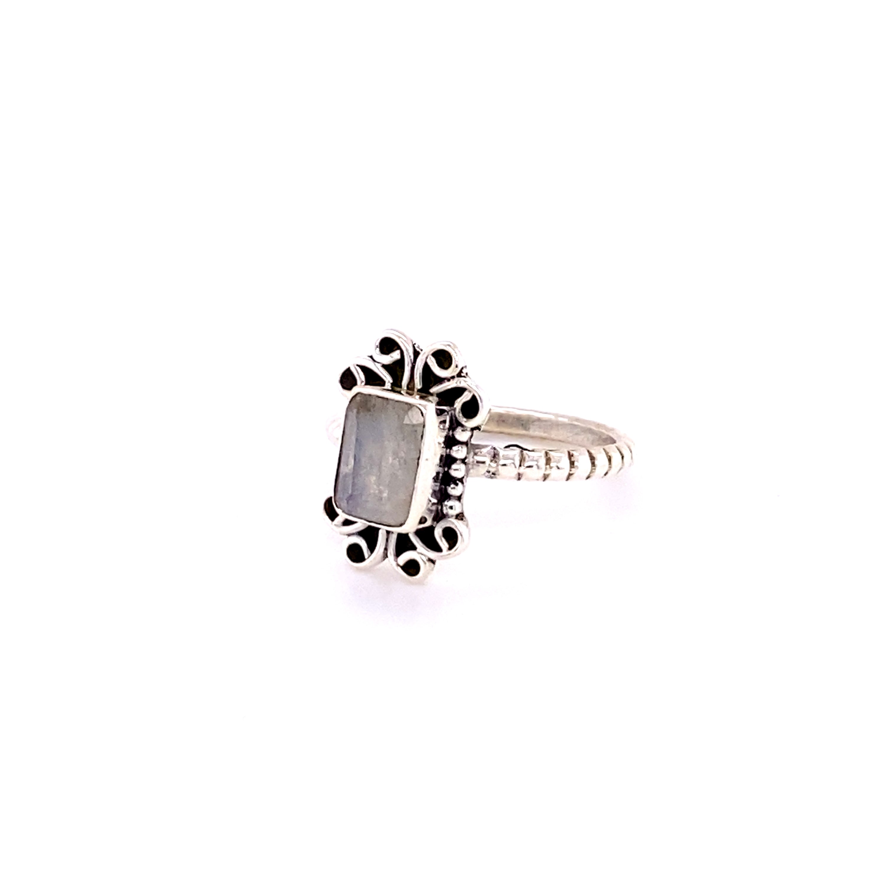 A Natural Gemstone Square Ring with Swirls with a square cabochon stone in the center.