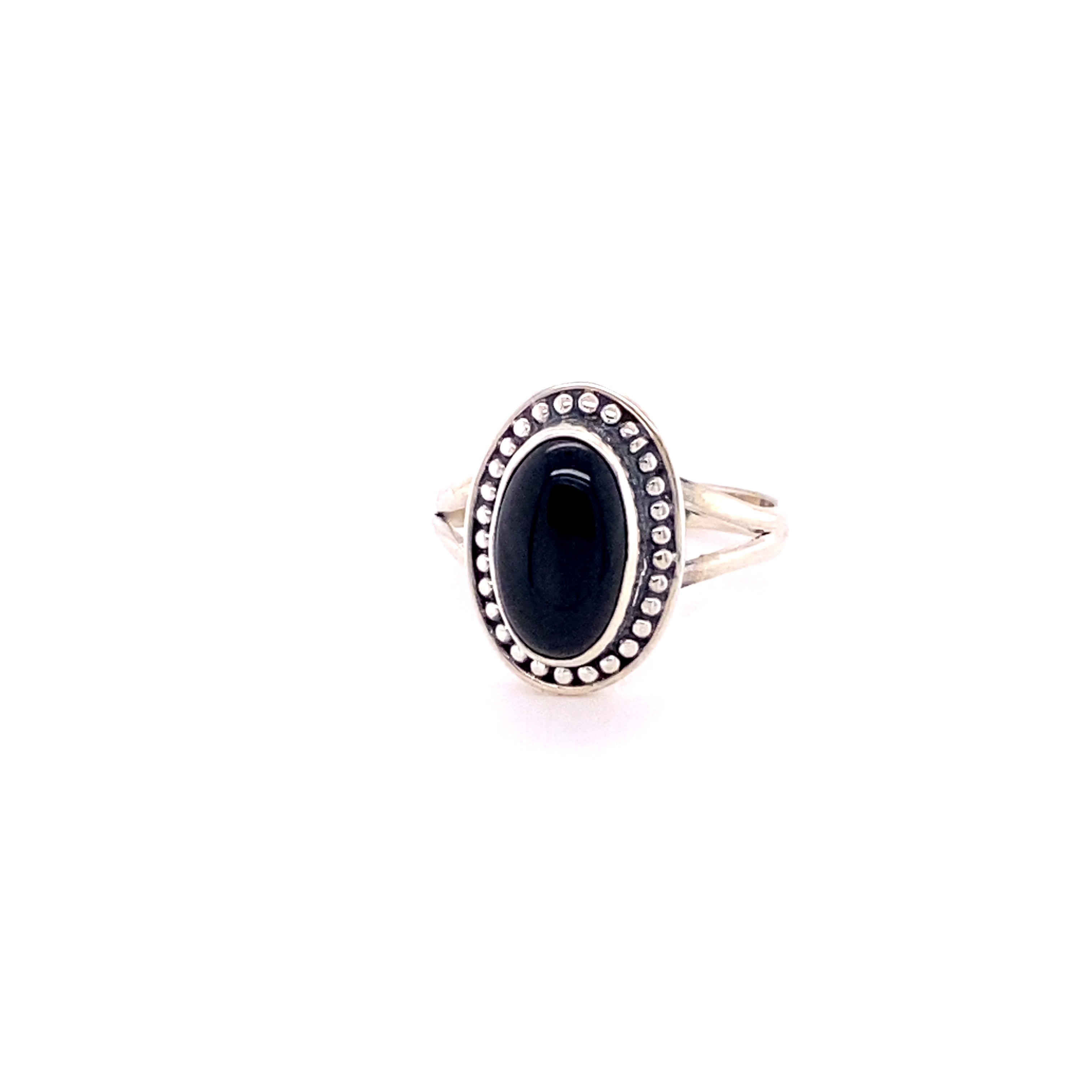 A Super Silver Trendy Oval Ring with a black stone and diamonds.
