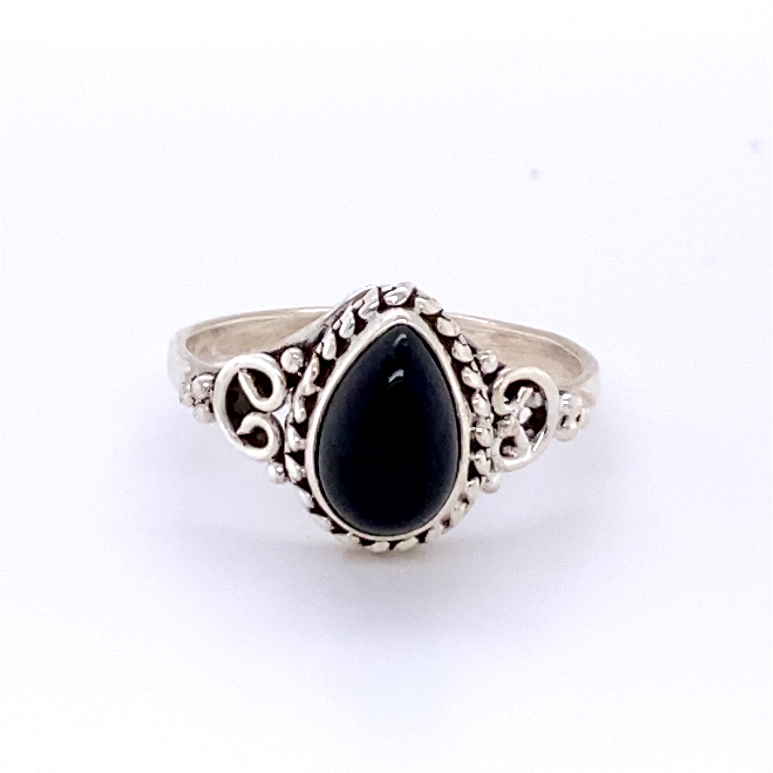 A boho Teardrop Gemstone Ring with Intricate Ball Border.