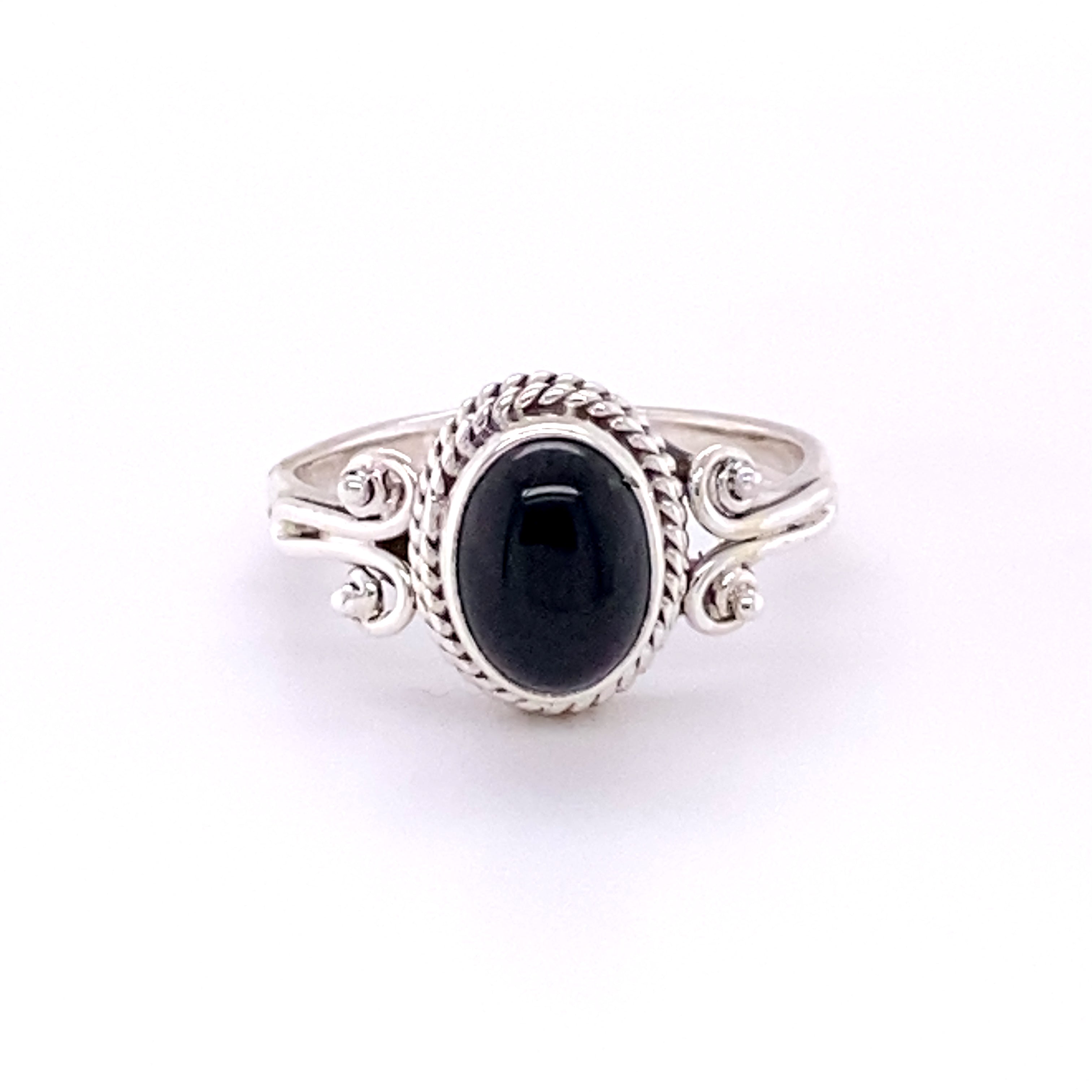 Boho-inspired Oval Natural Gemstone Ring with Rope and Long Spiral Border embedded with a stunning black onyx stone.