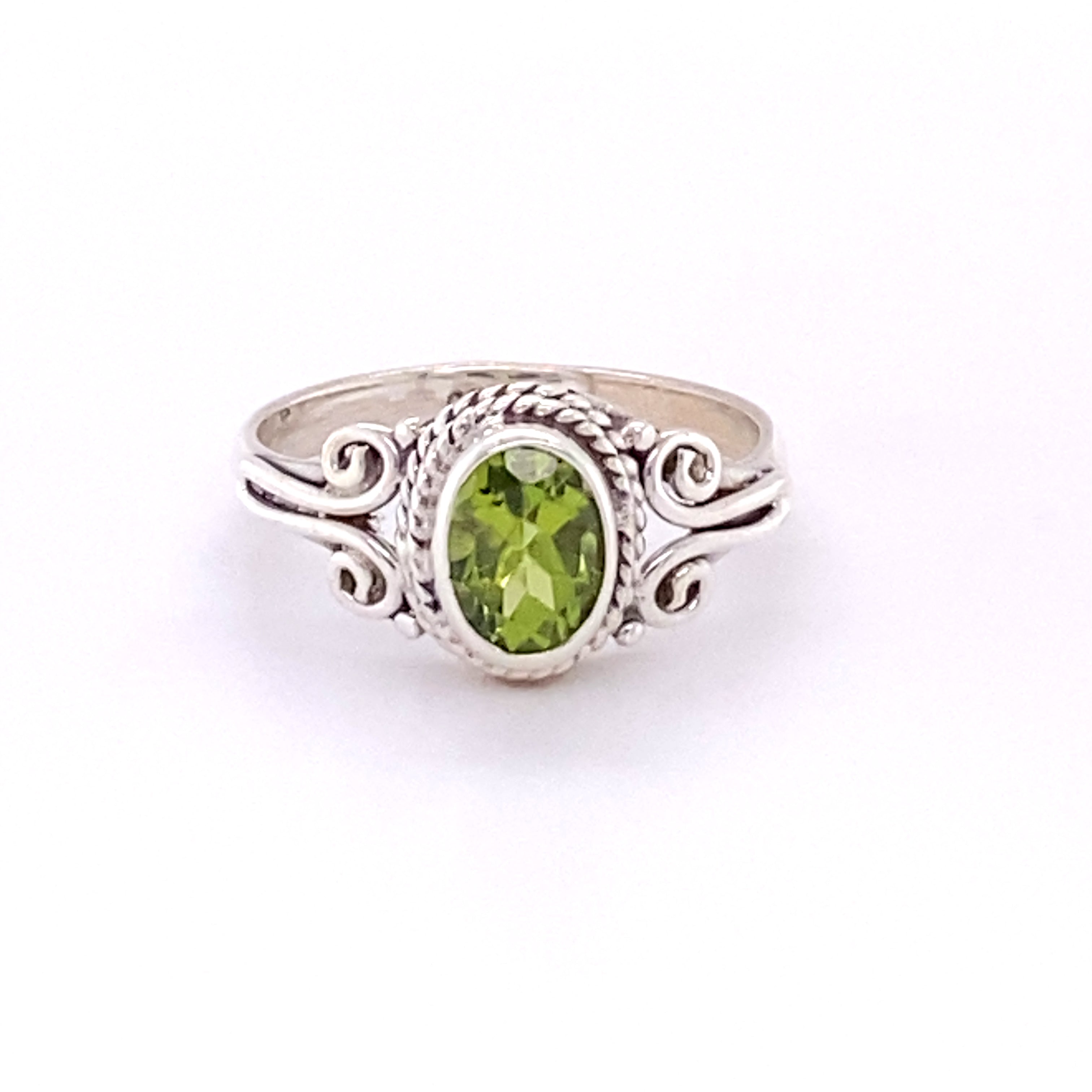 A sterling silver Oval Natural Gemstone Ring with Rope and Long Spiral Border.