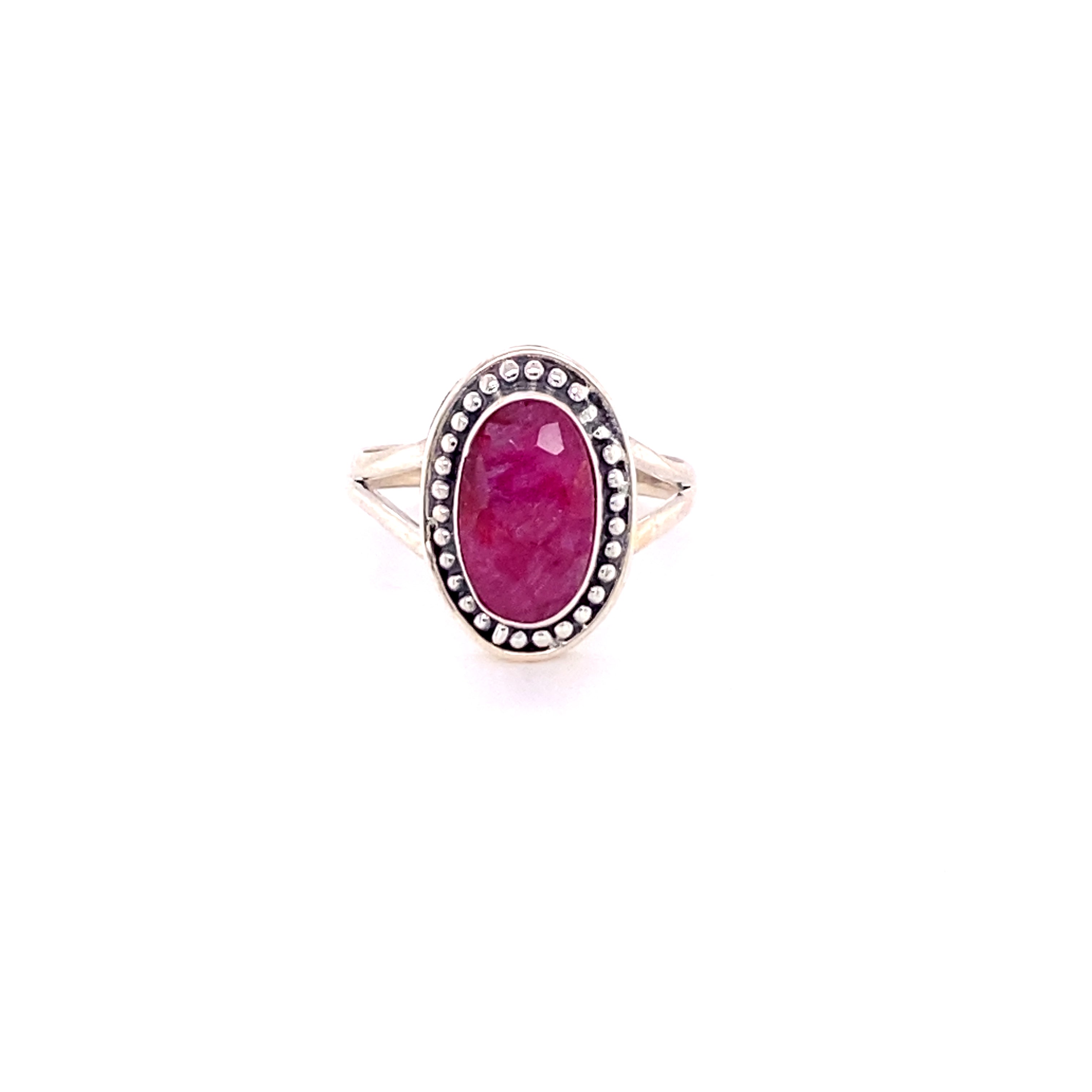 A stunning shield stone ring, the Trendy Oval Ring by Super Silver, featuring a vibrant ruby and sparkling diamonds, crafted with .925 Sterling Silver.