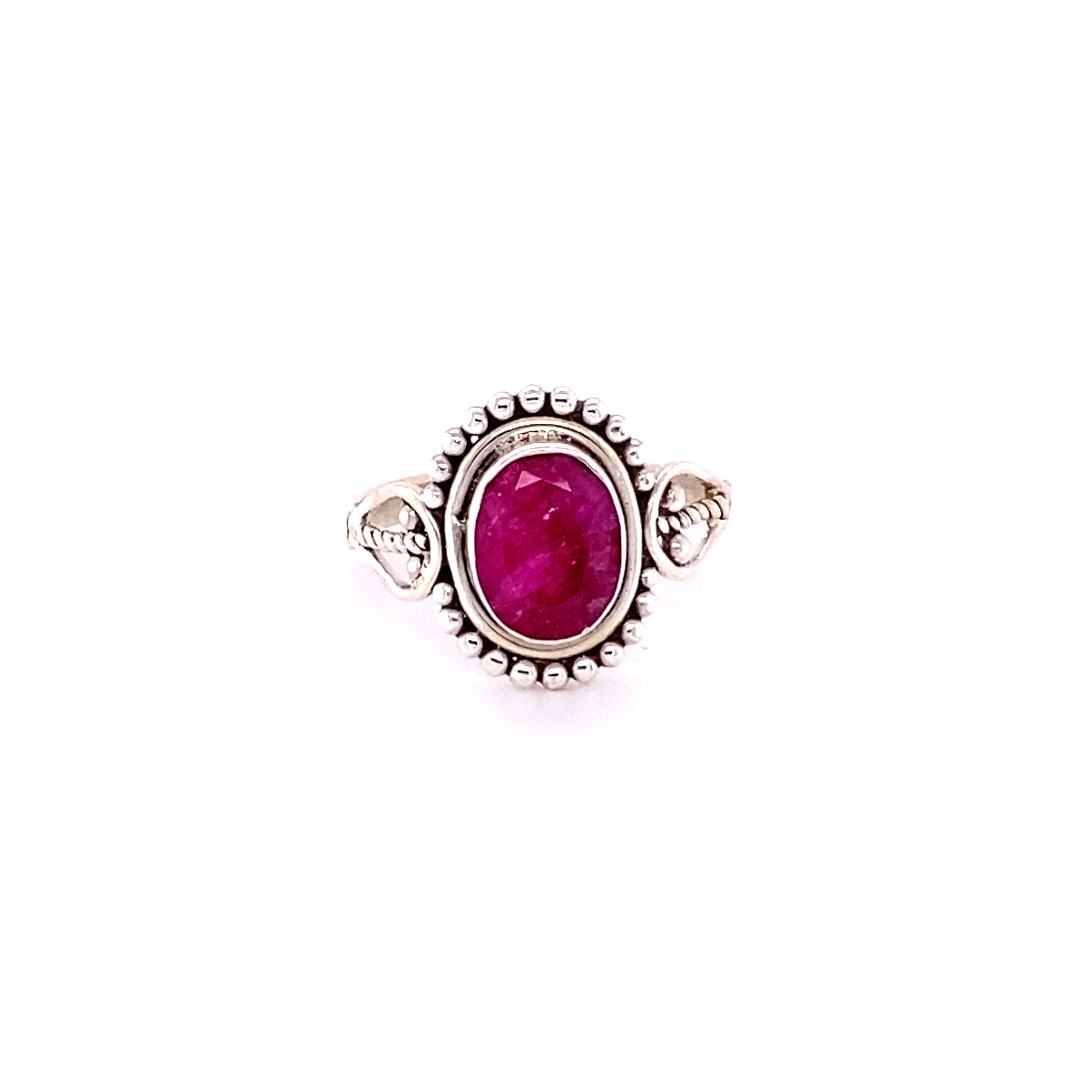 A boho-inspired sterling silver ring adorned with an Oval Gemstone with Ball Design.