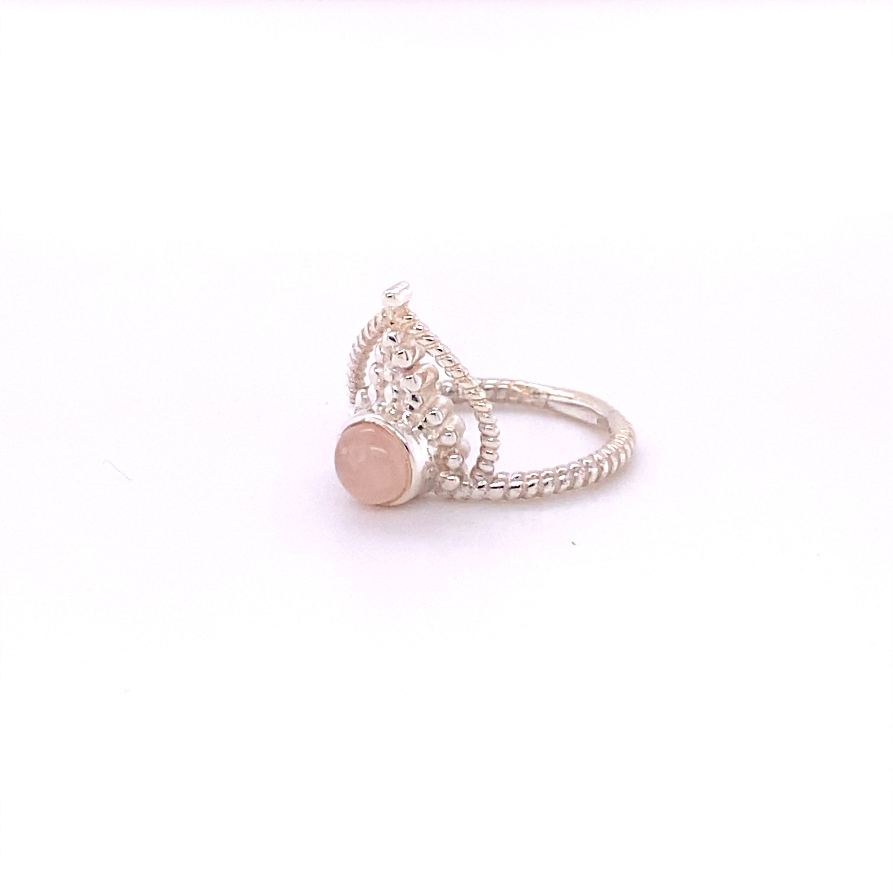 A Simple Tiara Ring with Natural Gemstones from Super Silver, featuring a henna design.