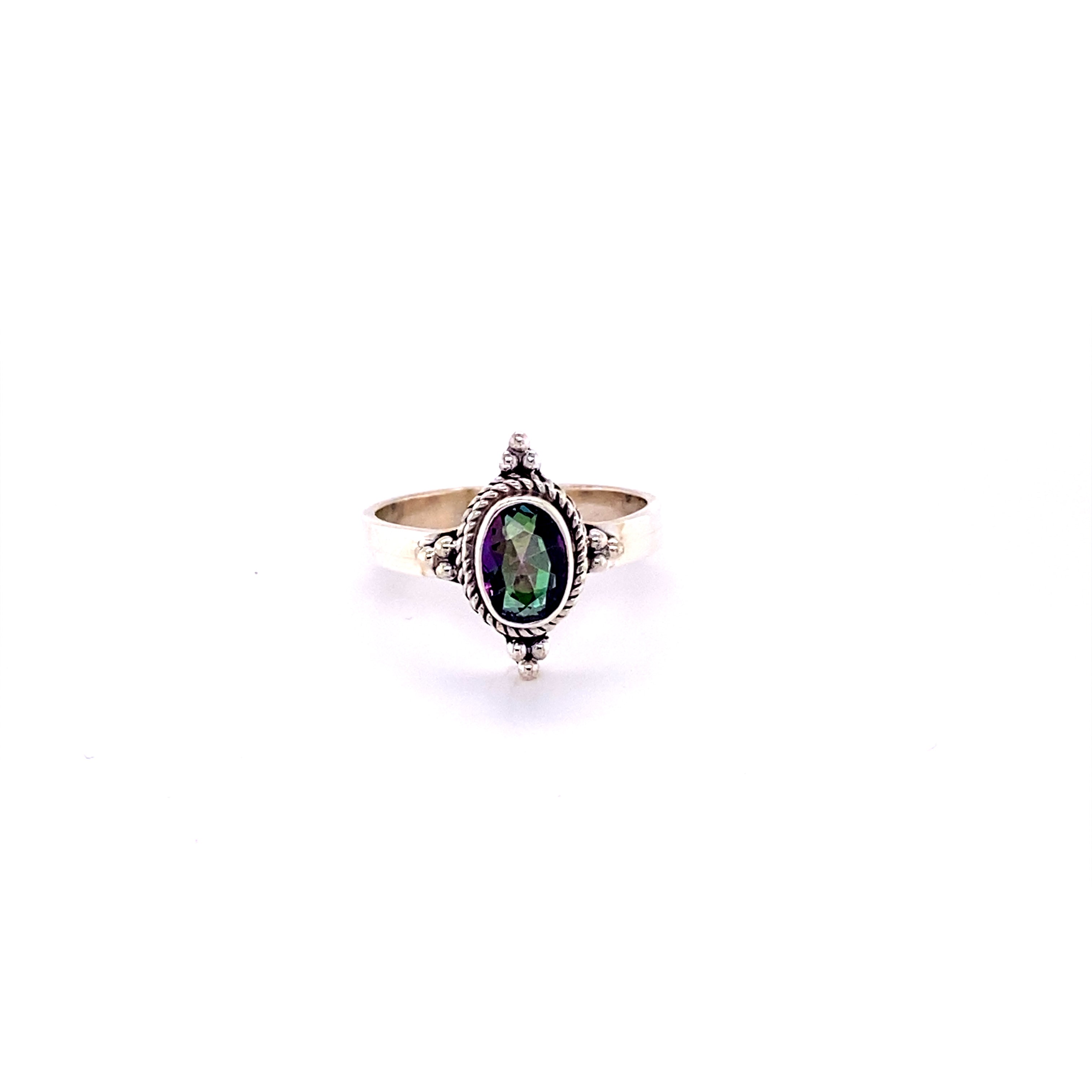 A hippie-inspired Four Points Gemstone Ring with a mesmerizing abalone stone.