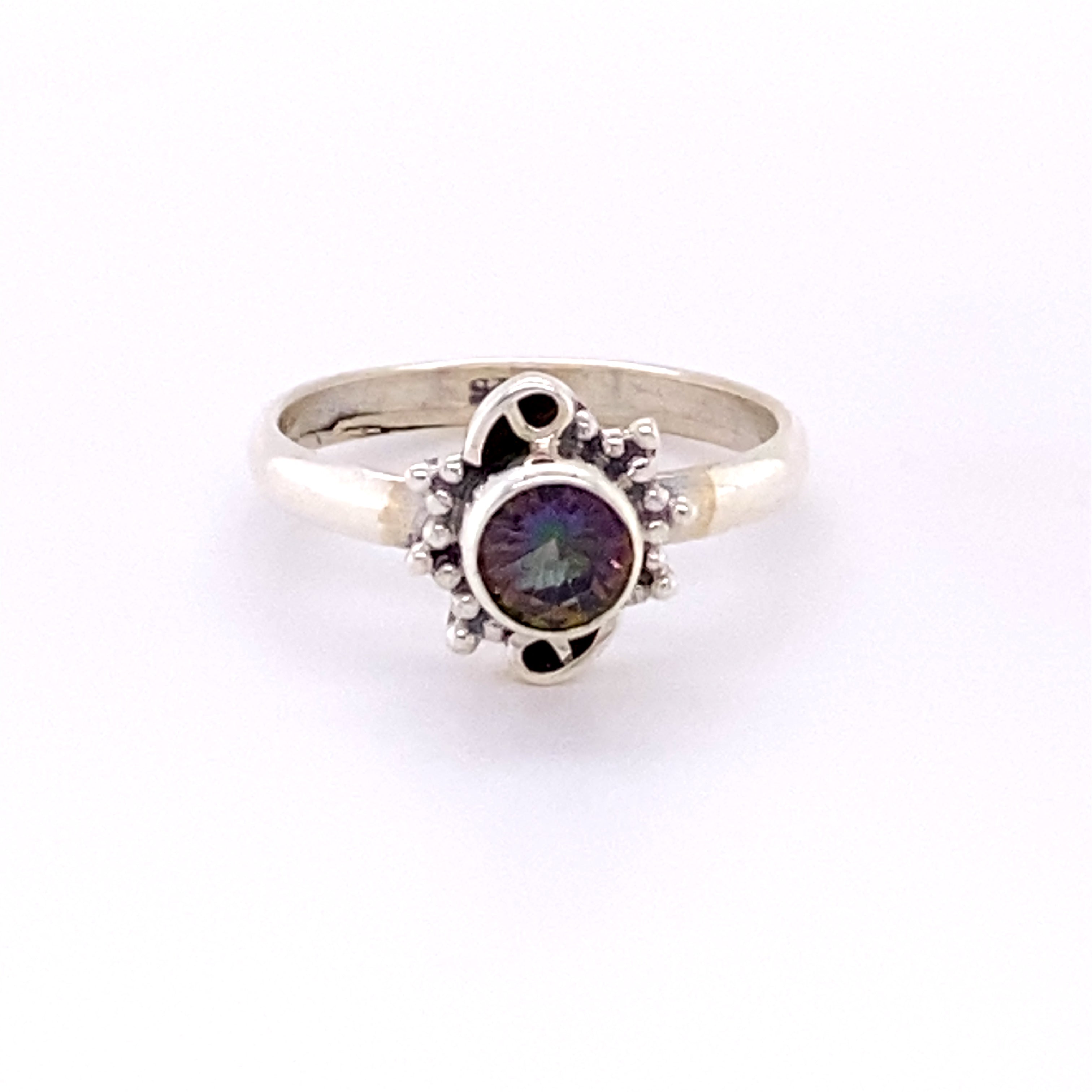 A Small Round Gemstone Ring with Bead and Swirl Border, perfect for the hippie vibe in Santa Cruz.