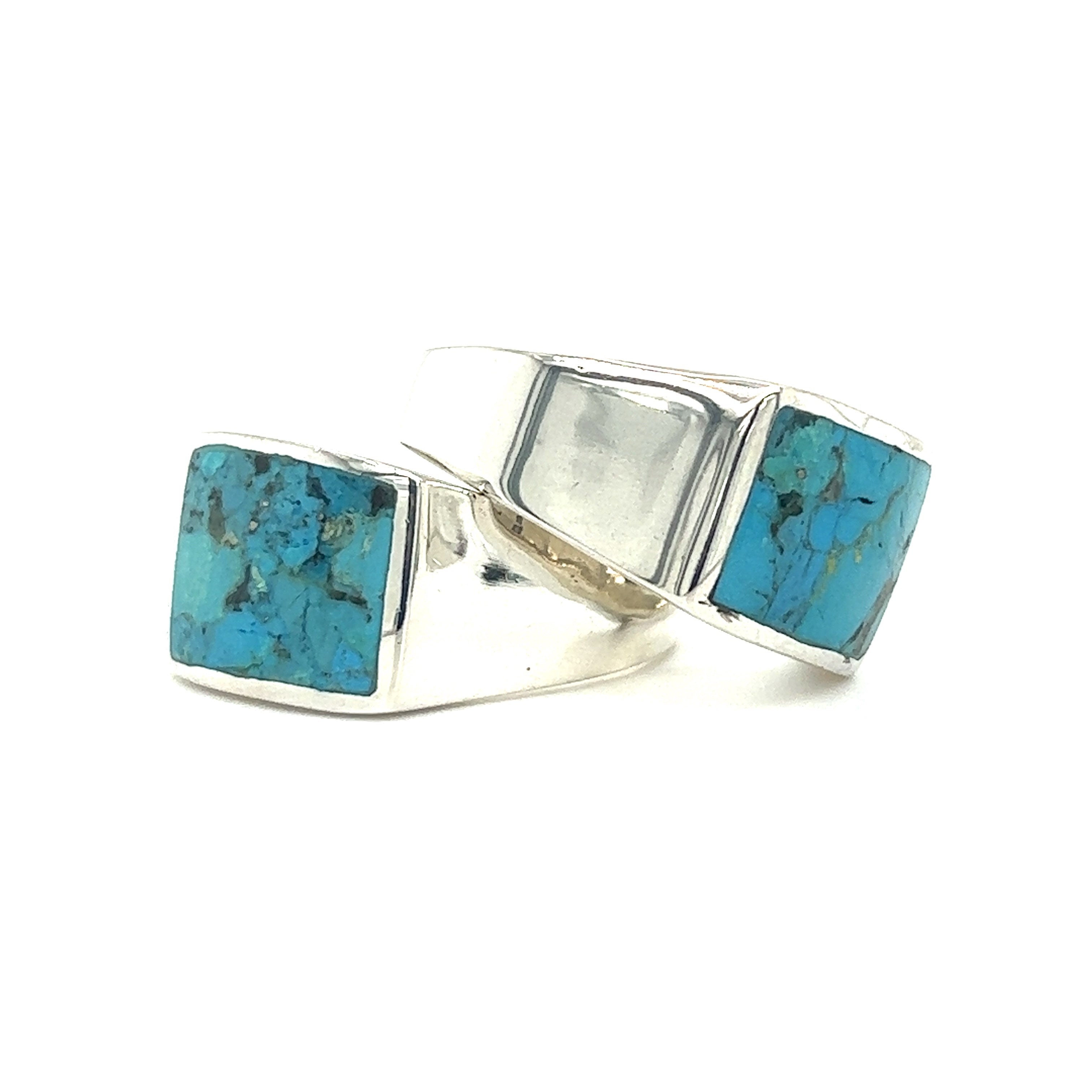 A pair of Super Silver Kingman Turquoise Signet Rings.