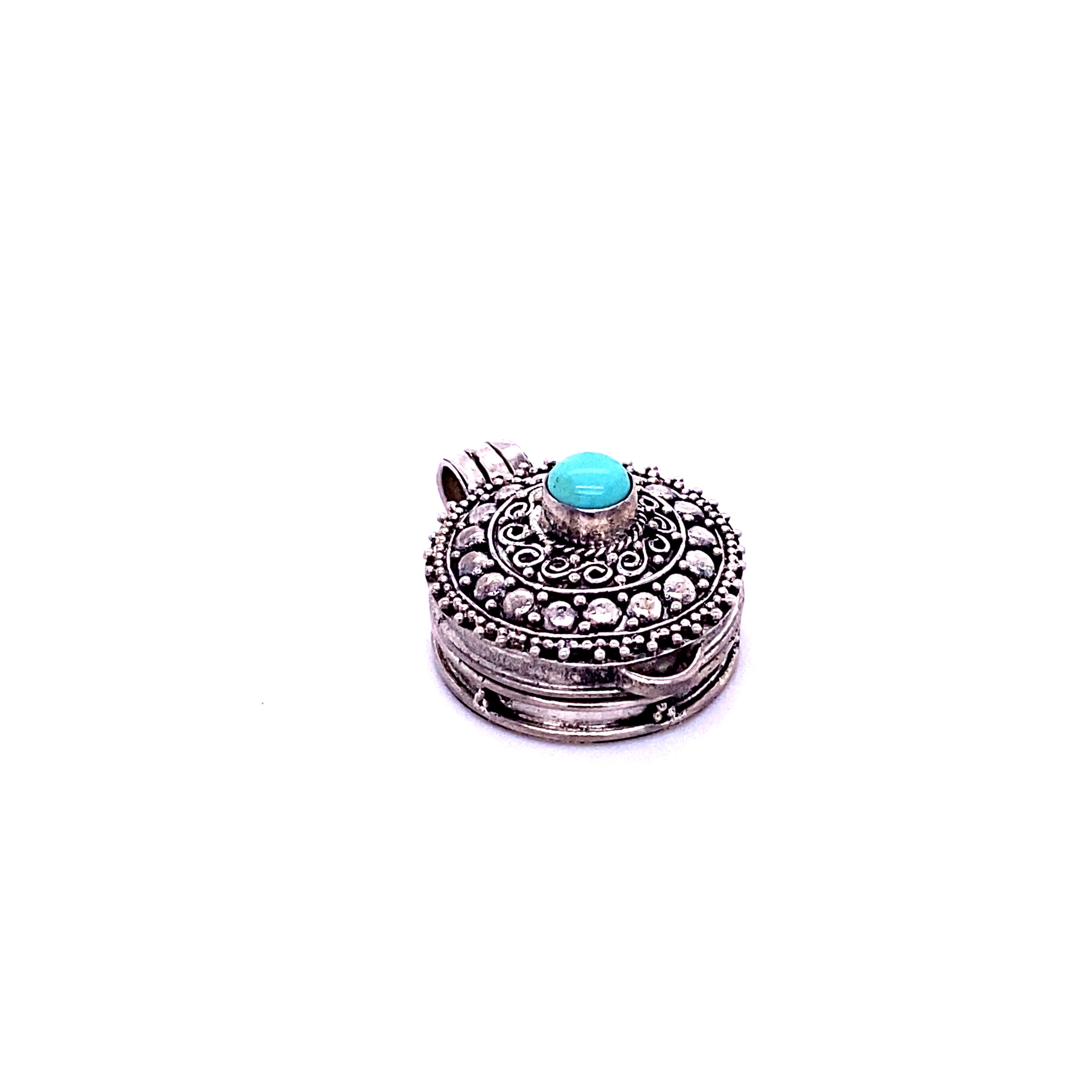 A Super Silver Stone Poison Locket with a turquoise stone.