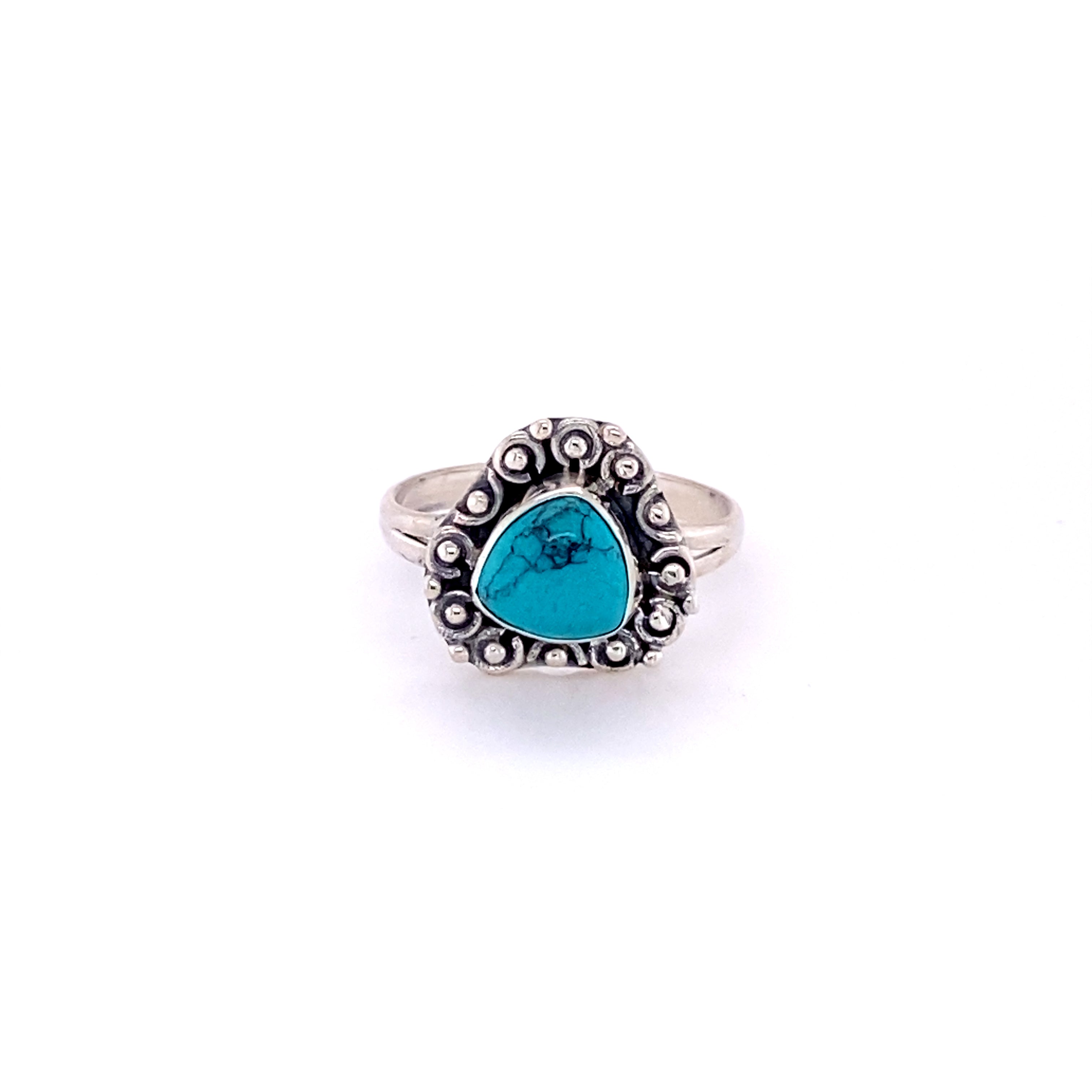 A triangular gemstone ring with a flat ball border in a boho style.