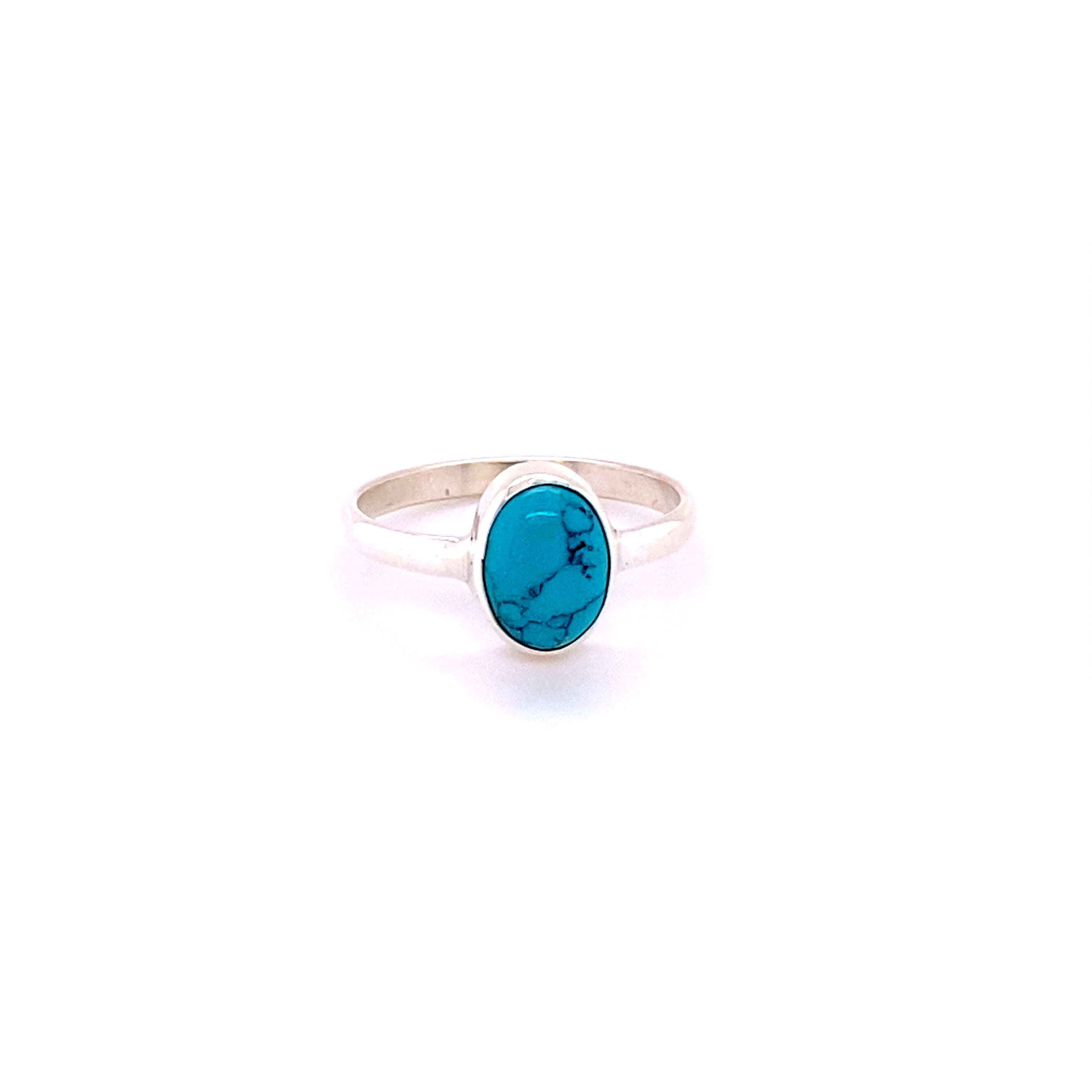 A Simple Oval Natural Gemstone Ring from Super Silver with a turquoise stone.