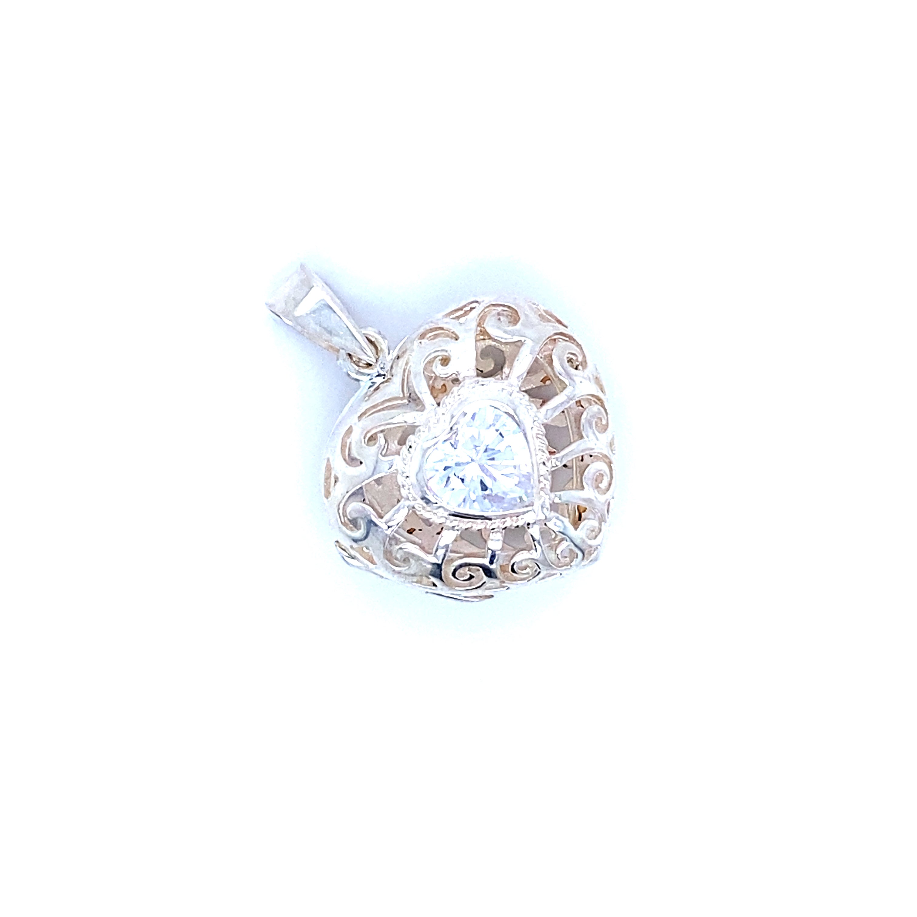 A Super Silver Heart Cage Locket With Cubic Zirconia Stones featuring a diamond in the center and filigree design.