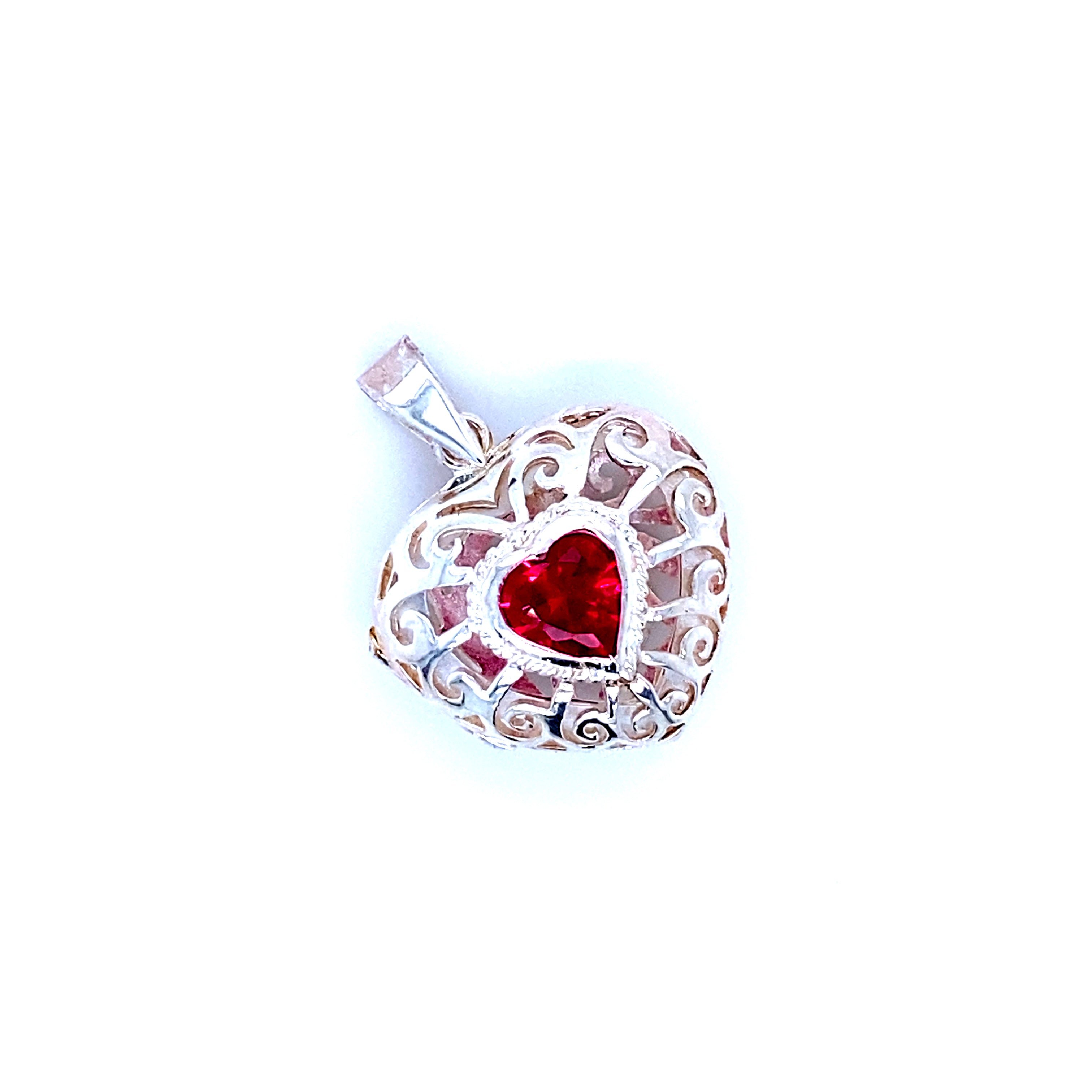 A Super Silver Heart Cage Locket With Cubic Zirconia Stones.