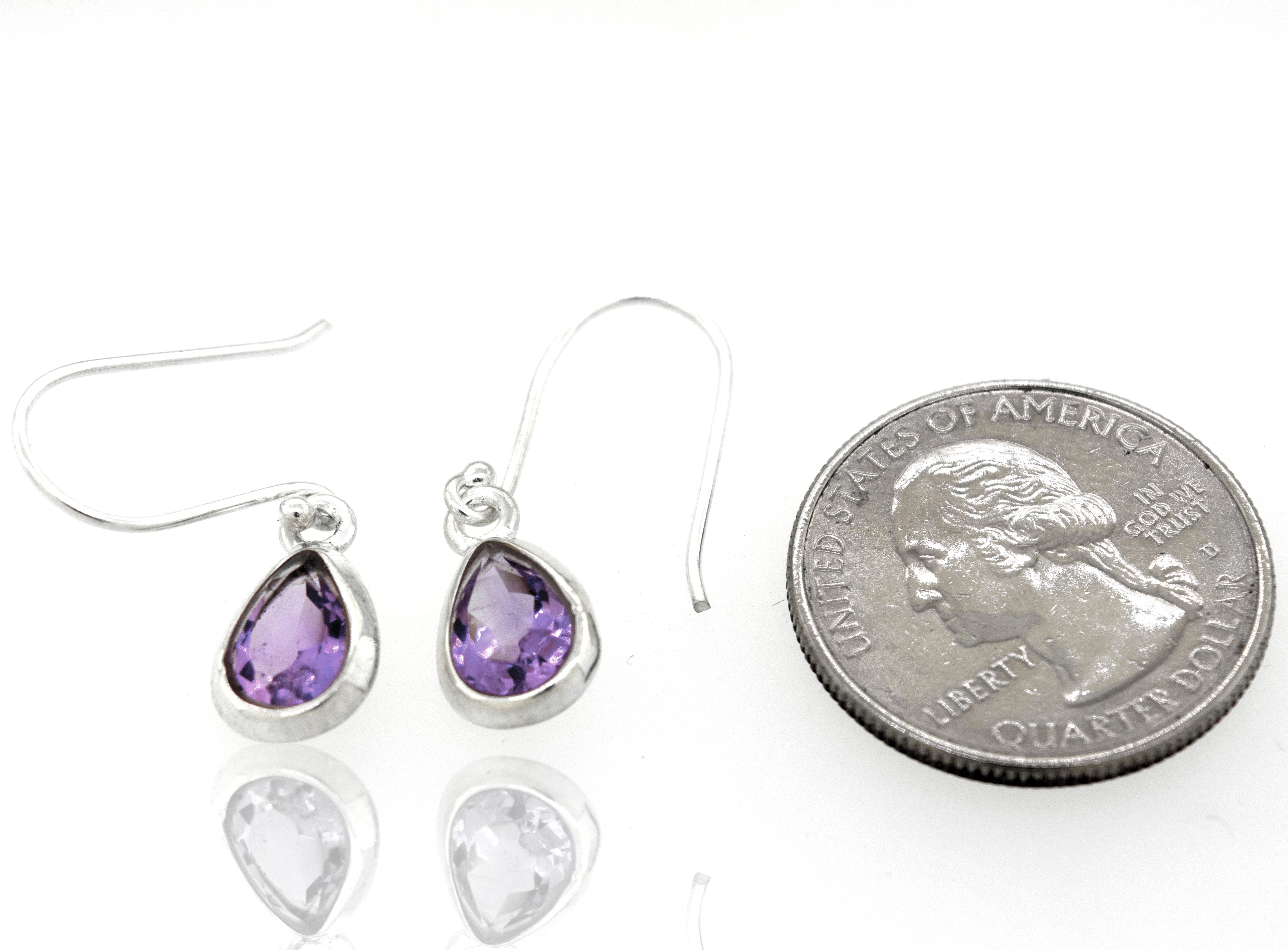 Super Silver presents the Simple Teardrop Shape Amethyst Earrings with a facet cut stone, set in a sterling silver setting.