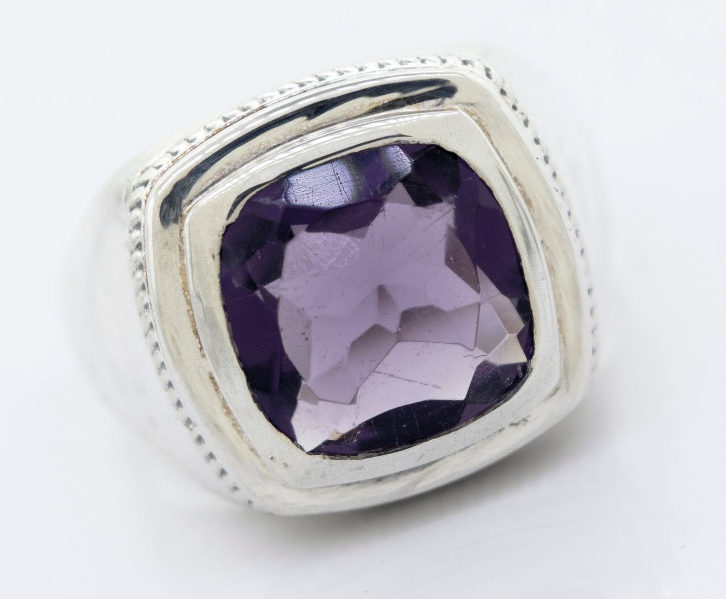 A minimalist sterling silver ring with a Amethyst Signet Ring.