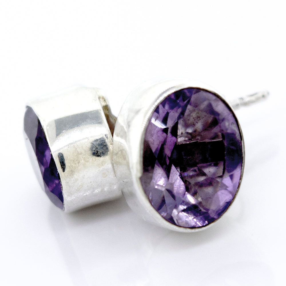 Beautiful Facet Cut Oval Amethyst Studs by Super Silver in sterling silver setting.