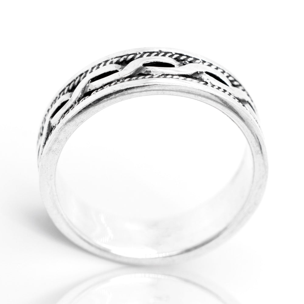 
                  
                    An intricate Celtic design adorns this Braided Rope Band.
                  
                
