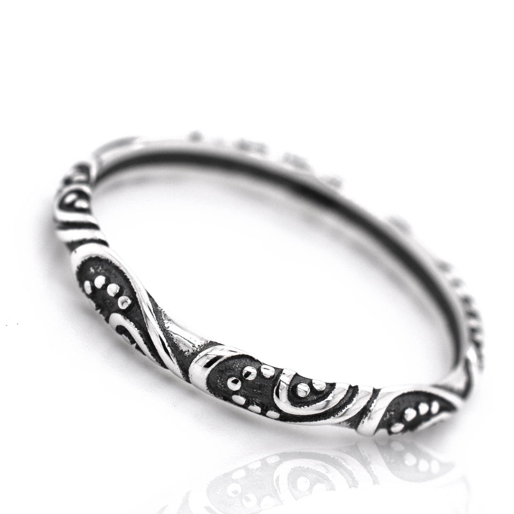 
                  
                    A Delicate Bali Style Band from Super Silver, made of .925 sterling silver, with ornate black and white vintage designs.
                  
                